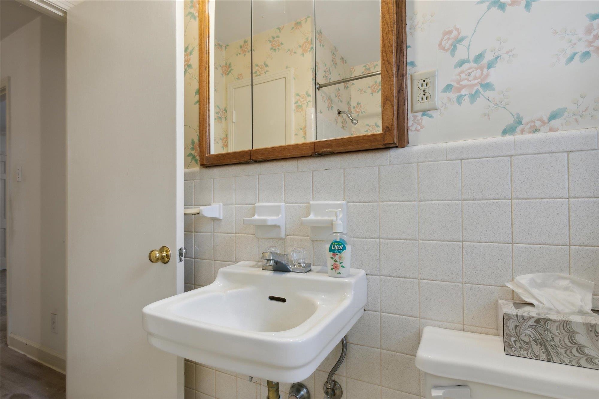 6173 Ivanhoe Road Bartlett, TN 38134 - Photo 24 of 35 a bathroom with a sink and a toilet