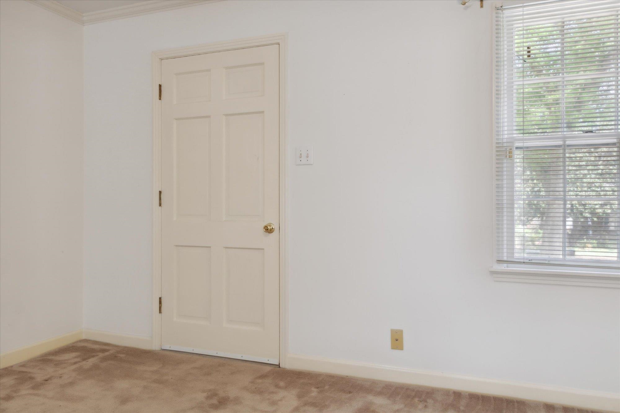 6173 Ivanhoe Road Bartlett, TN 38134 - Photo 8 of 35 an empty room with a window