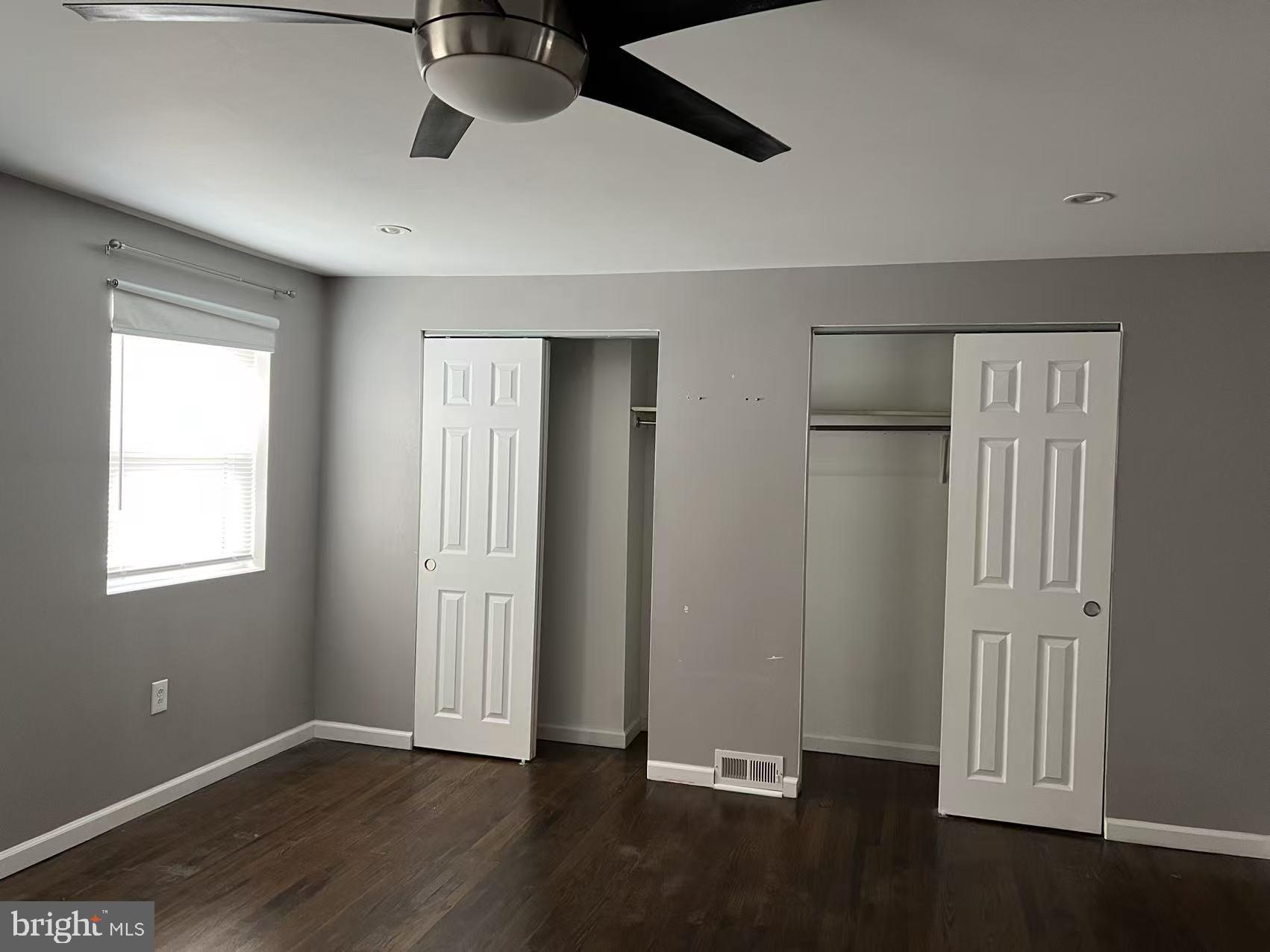 12712 Elnora Road Philadelphia, PA 19154 - Photo 10 of 16 a view of an empty room with wooden floor and a window