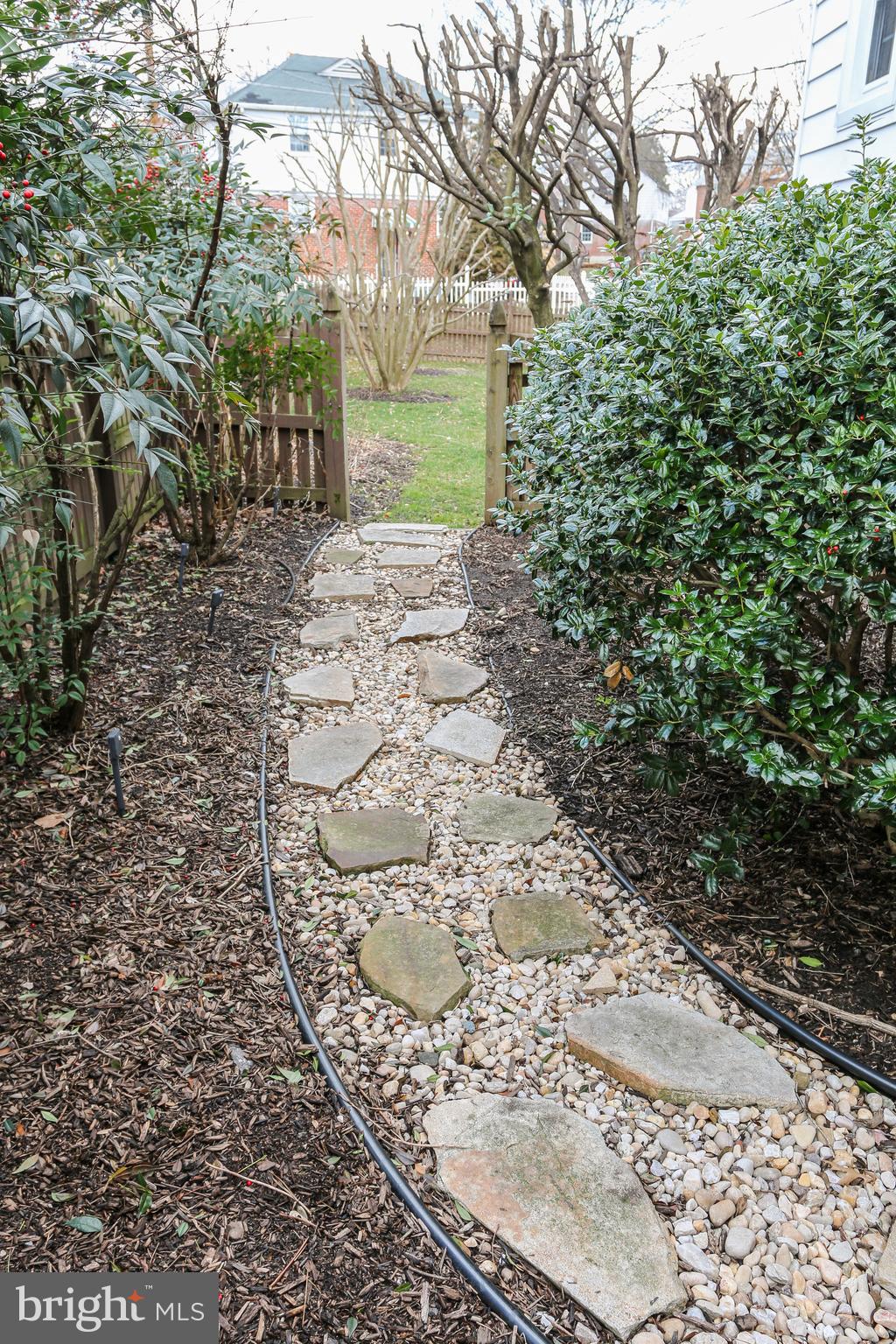 4208 Fordham Road Baltimore, MD 21229 - Photo 25 of 37 Side yard walkway
