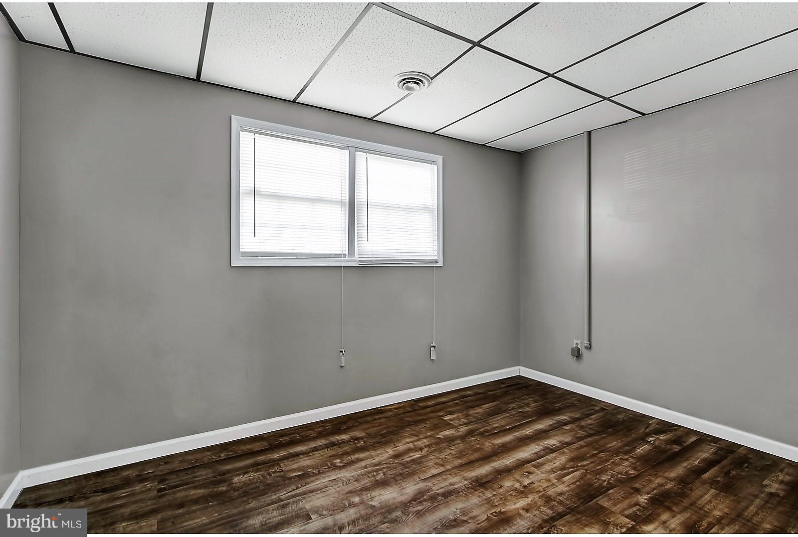 1663 Taylor Drive Hanover, PA 17331 - Photo 23 of 29 a view of a room with wooden floor and windows