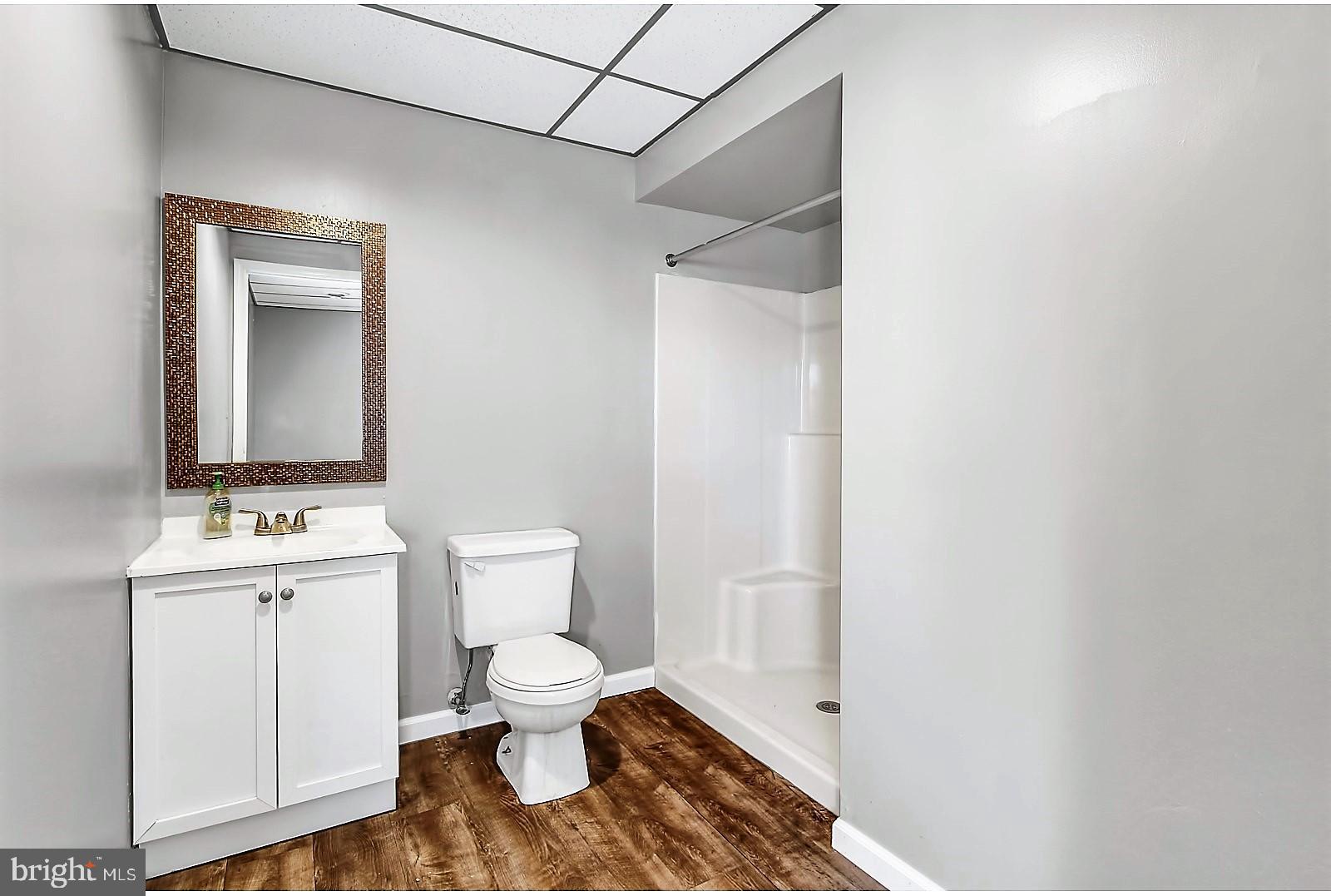 1663 Taylor Drive Hanover, PA 17331 - Photo 24 of 29 a bathroom with a toilet a sink and mirror