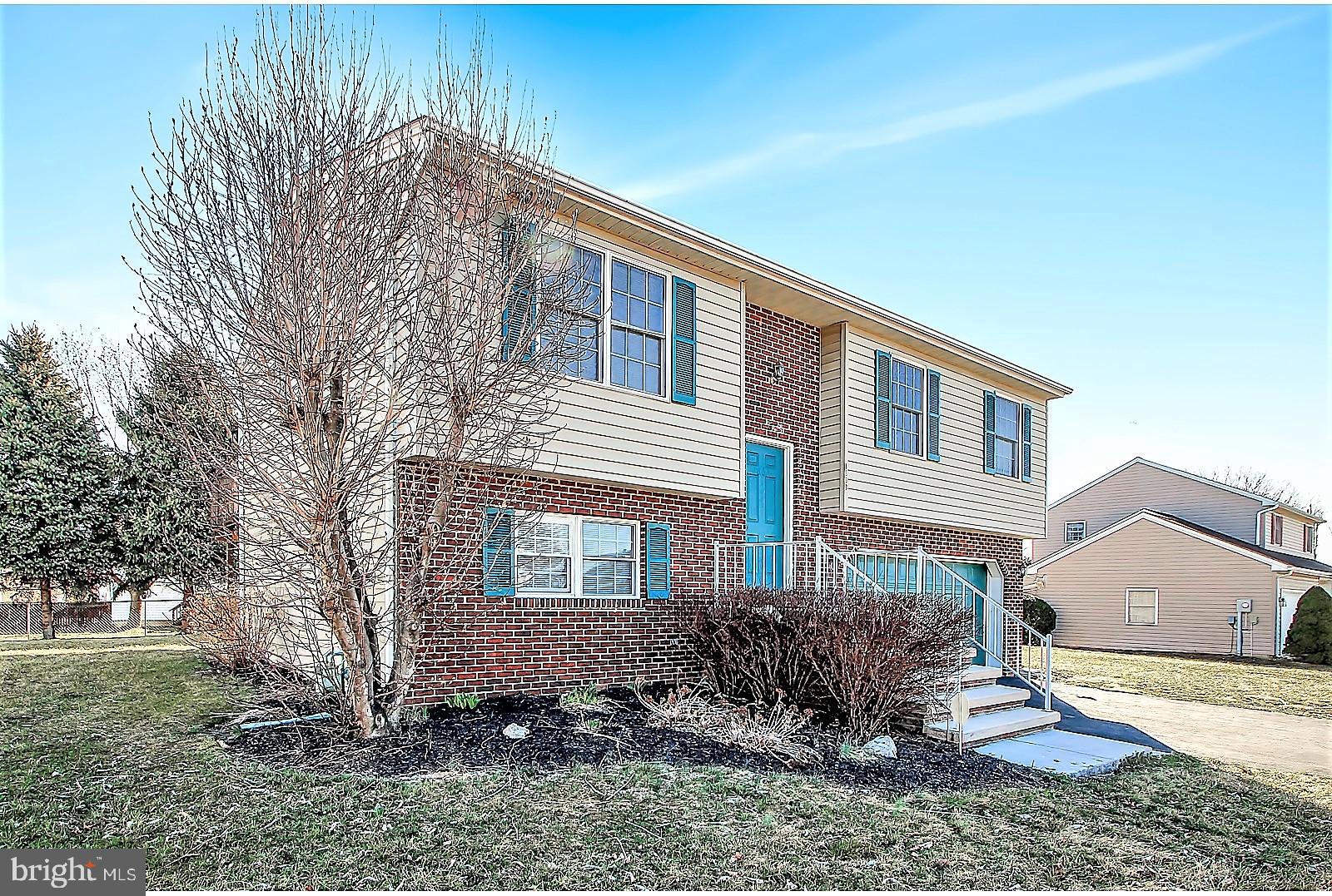 1663 Taylor Drive Hanover, PA 17331 - Photo 5 of 29 a front view of a house with a yard