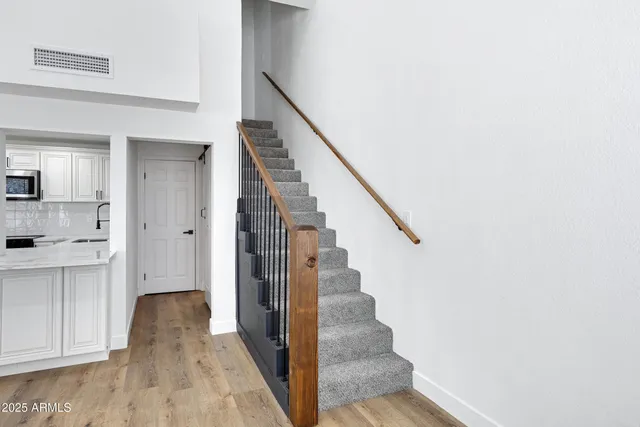 an empty room with closet area