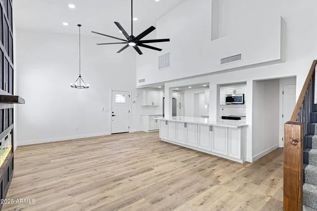 a bedroom with a bed and a fireplace