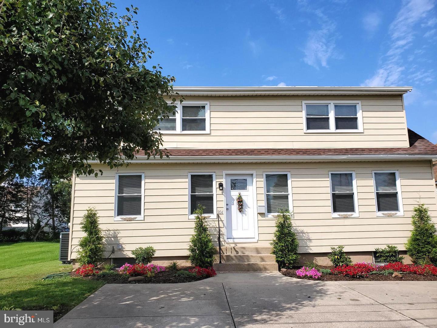 304 Newport Road Bristol, PA 19007 - Photo 1 of 26 Charming home with vibrant landscaping.