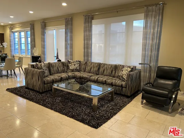 a view of a living room and bathroom