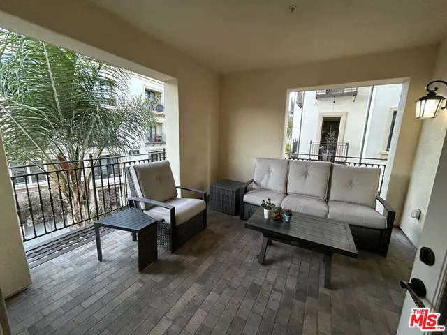 a view of a balcony with an outdoor space