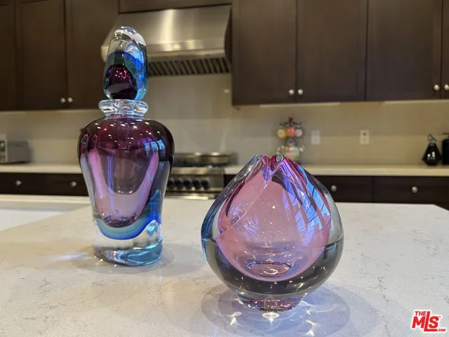 a kitchen with a stove and a microwave