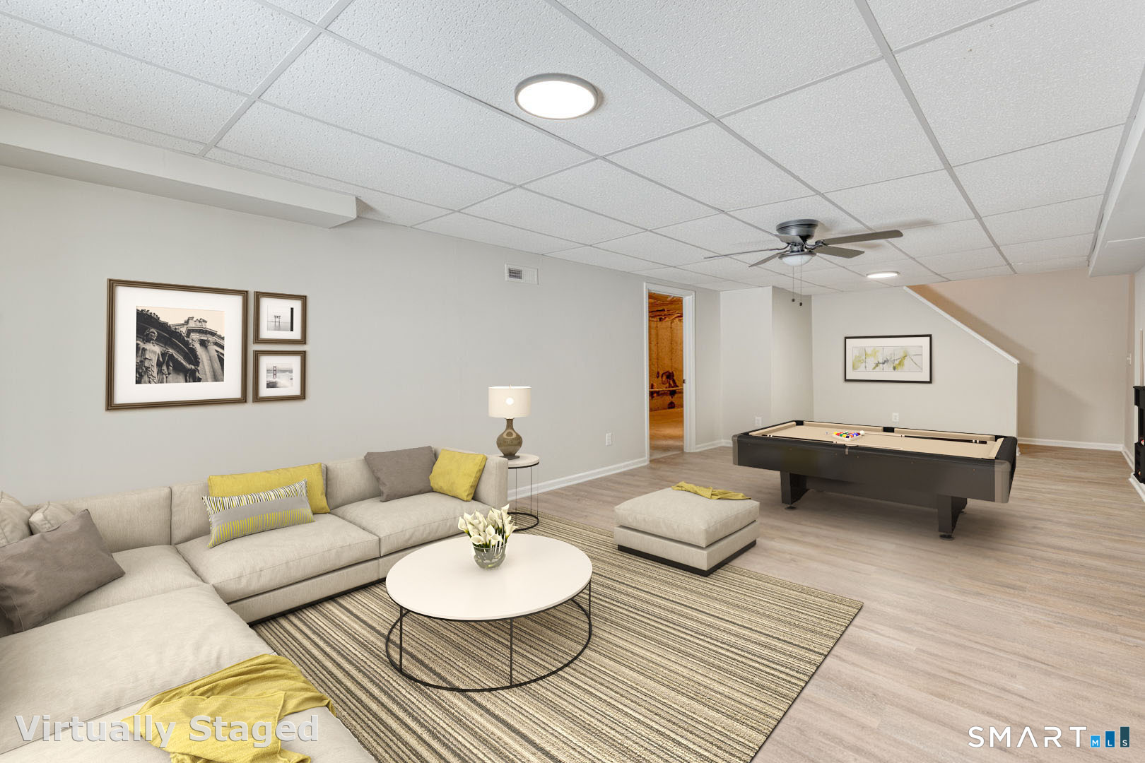 159 Jennifer Lane, Unit 159 Newtown, CT 06482 - Photo 24 of 29 a living room with furniture and wooden floor