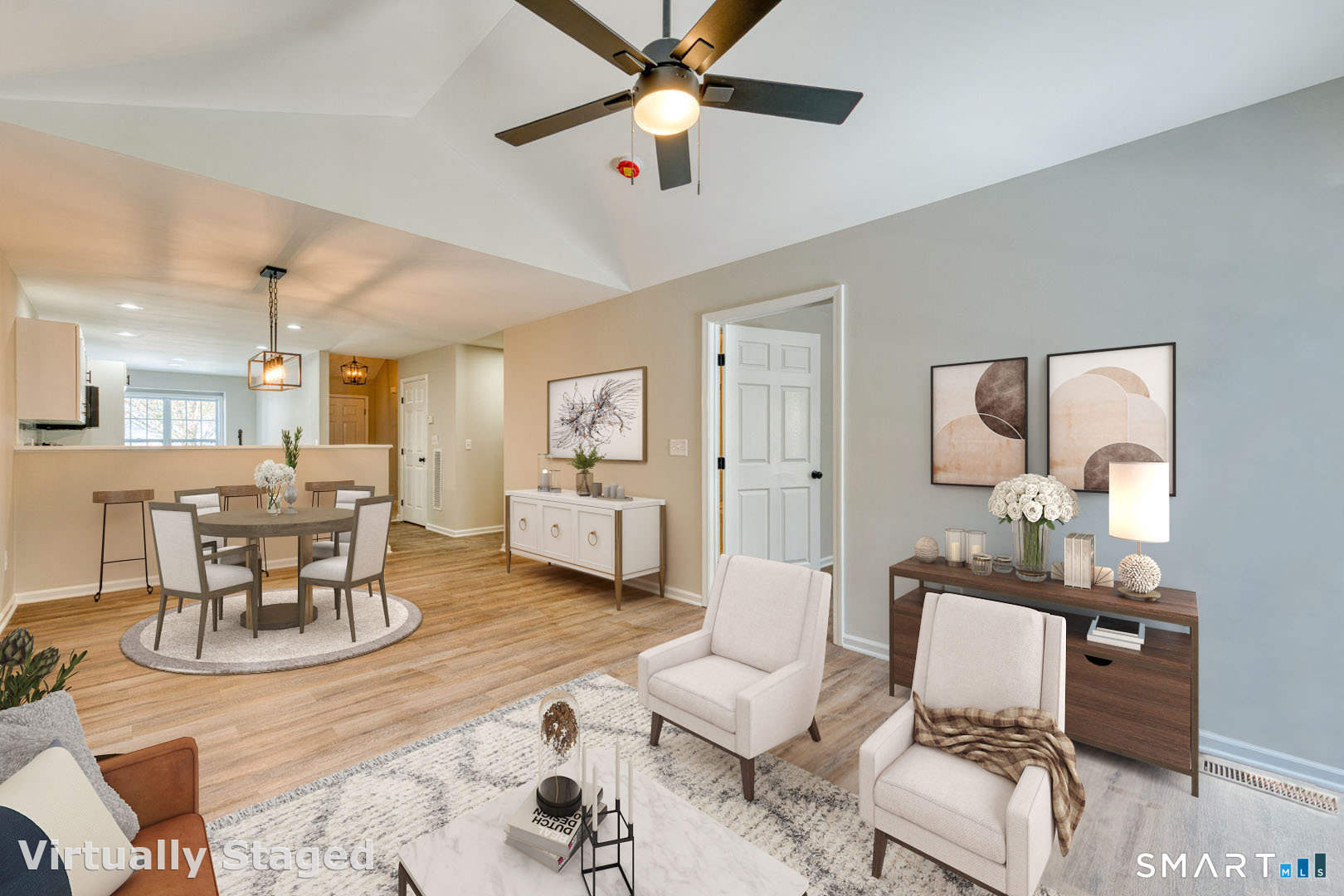 159 Jennifer Lane, Unit 159 Newtown, CT 06482 - Photo 5 of 29 a living room with furniture and a wooden floor