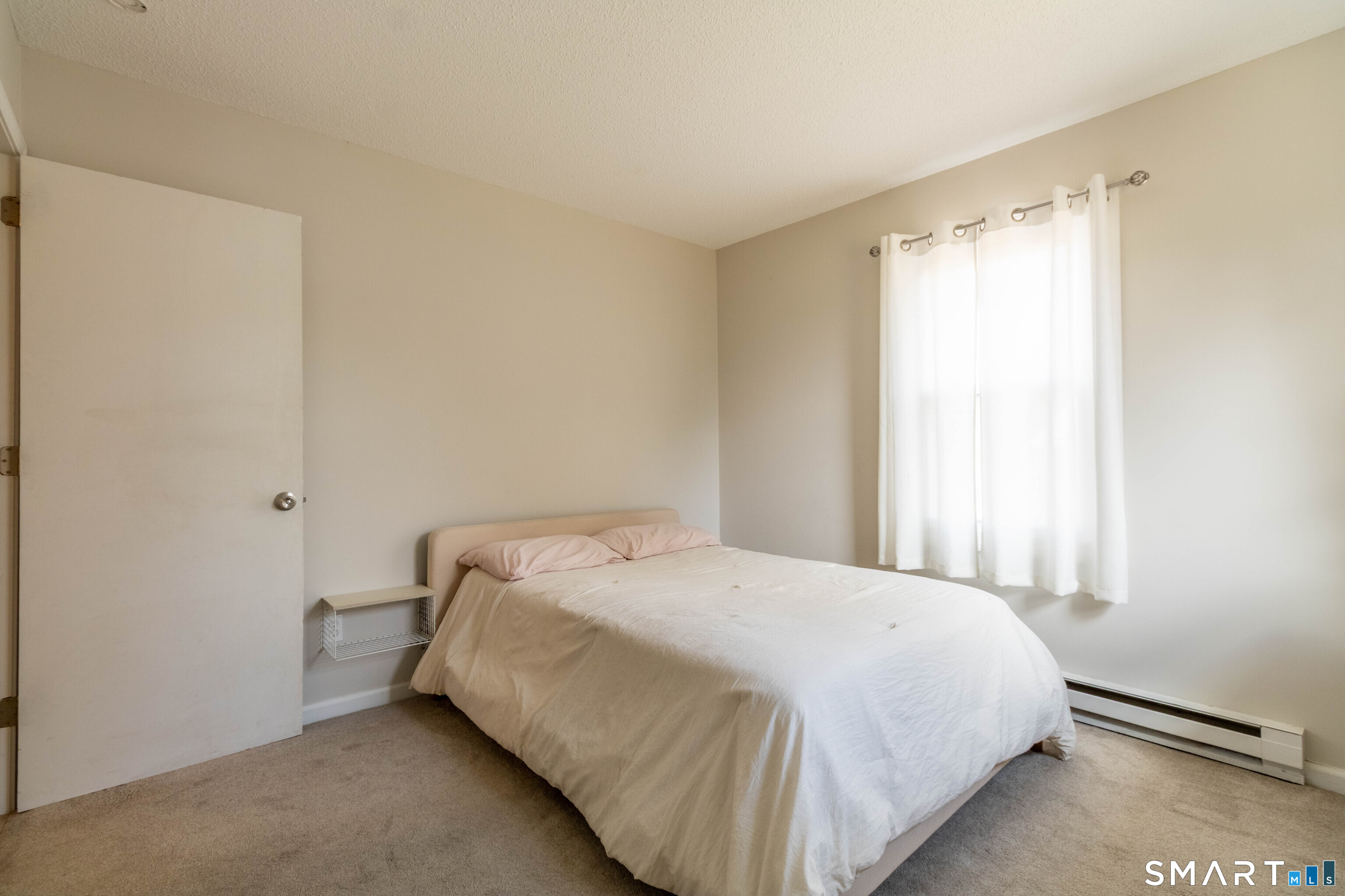 63 Whittemore Street Windham, CT 06226 - Photo 11 of 35 Primary bedroom.