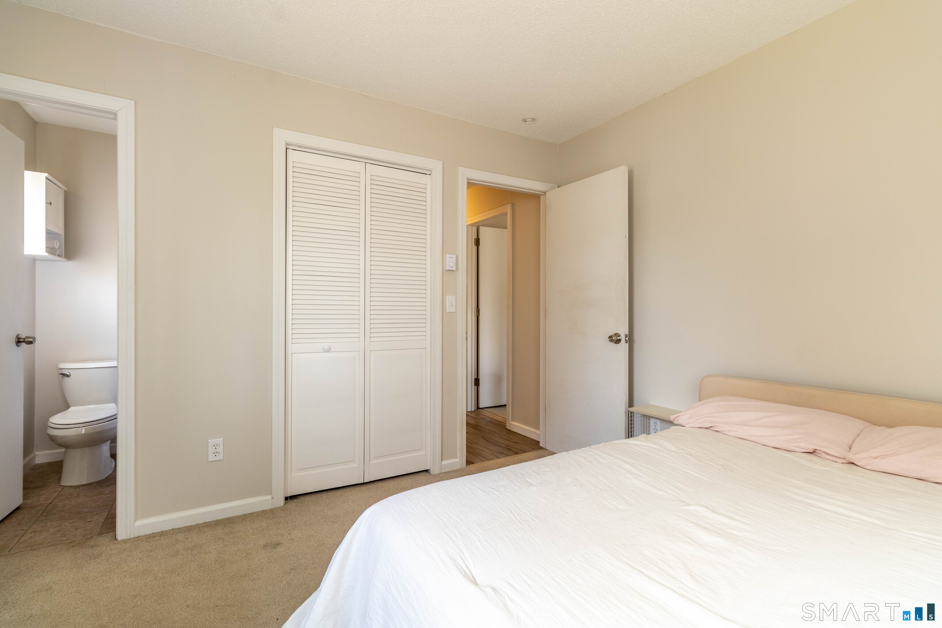 63 Whittemore Street Windham, CT 06226 - Photo 12 of 35 Primary bedroom - full bath on left.