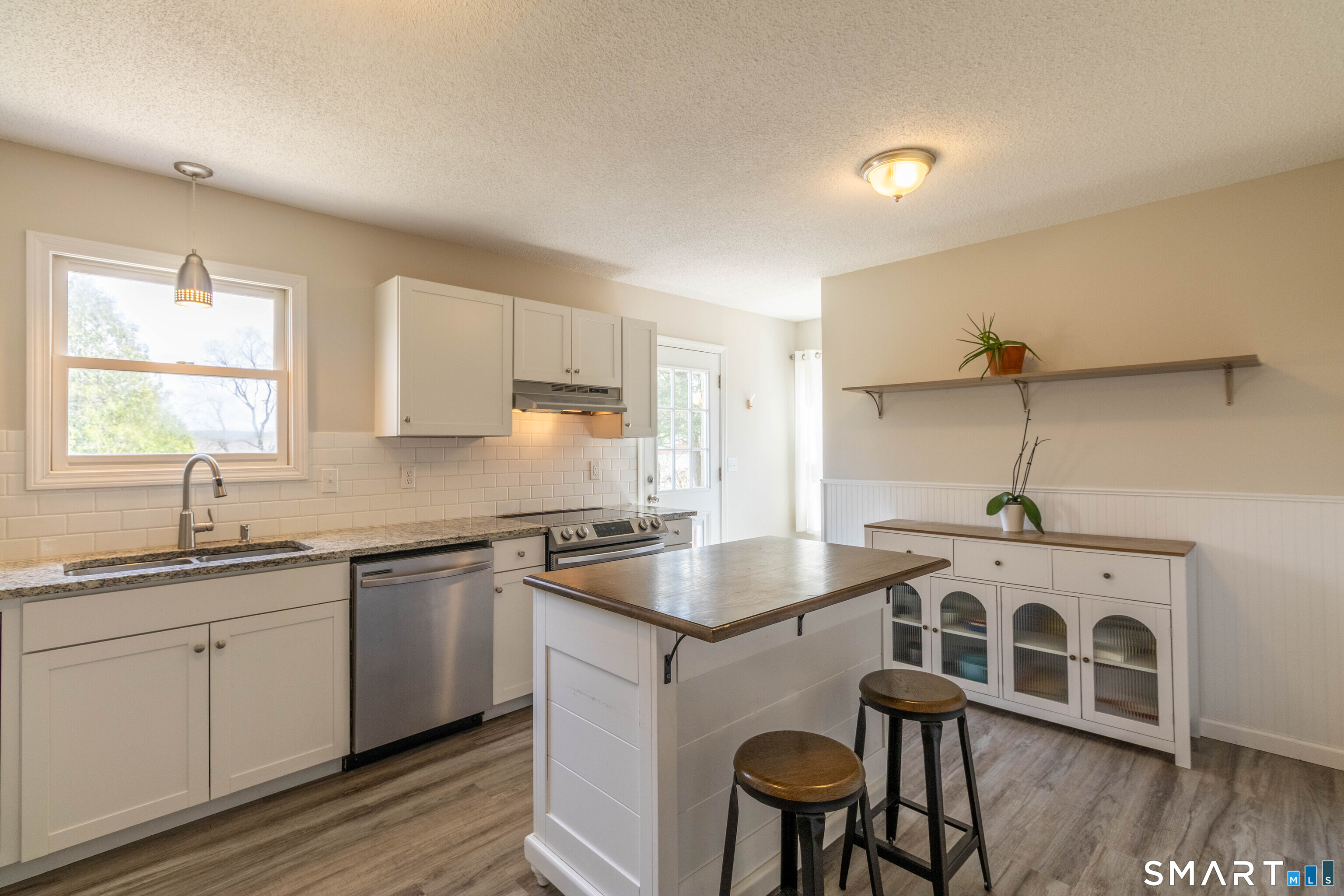 63 Whittemore Street Windham, CT 06226 - Photo 2 of 35 Lots of natural light in the kitchen.
