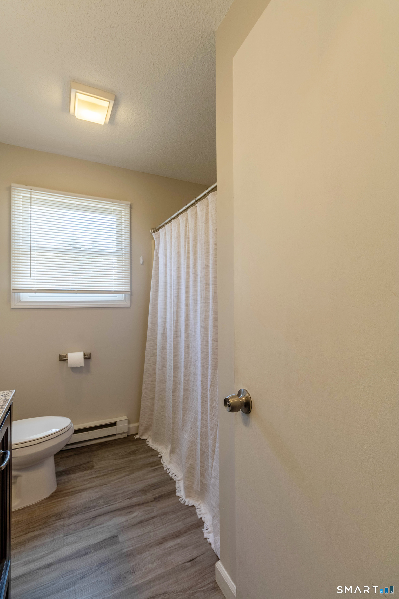 63 Whittemore Street Windham, CT 06226 - Photo 22 of 35 Full Bath with tub/shower.