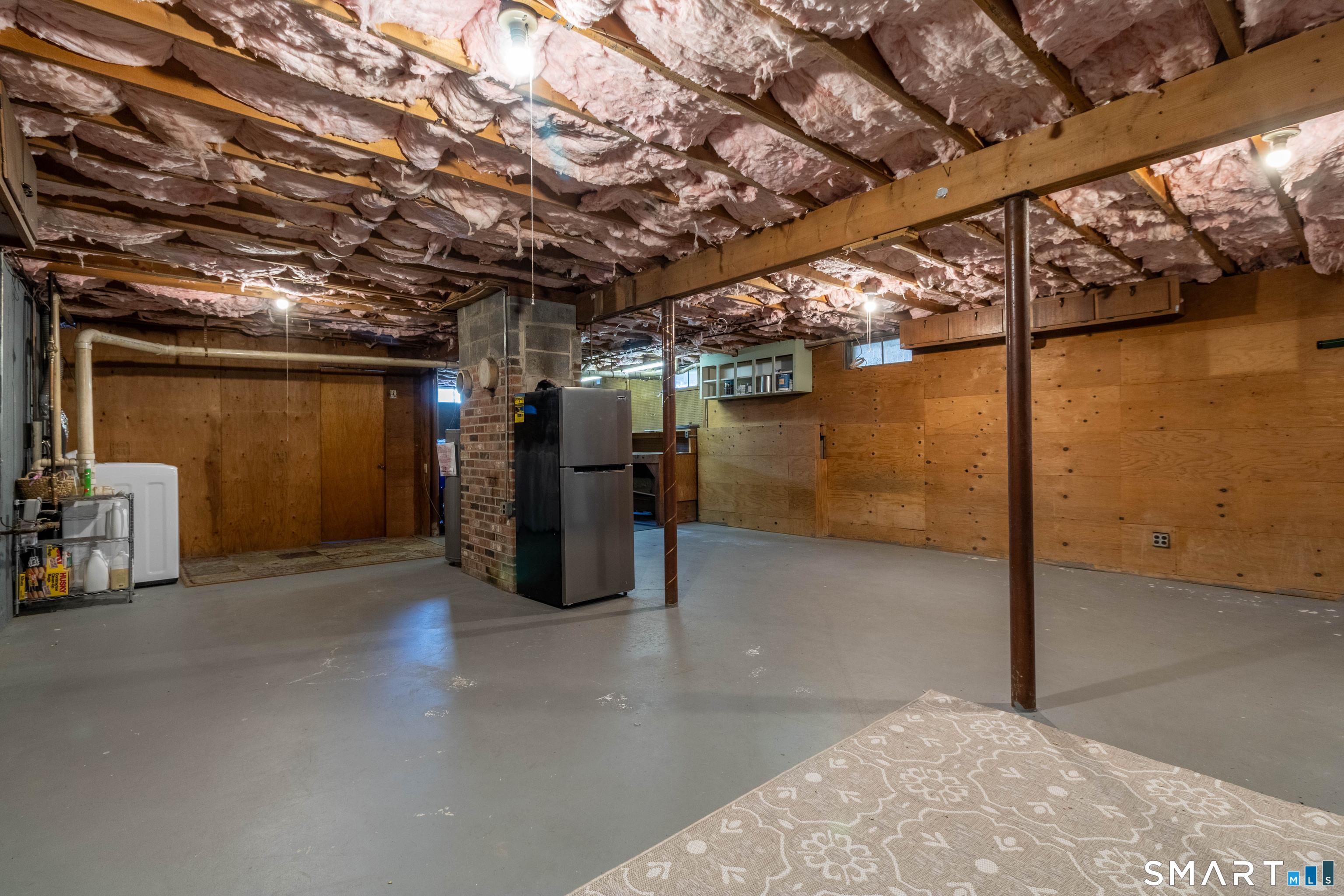 63 Whittemore Street Windham, CT 06226 - Photo 24 of 35 Very clean basement with high ceilings.