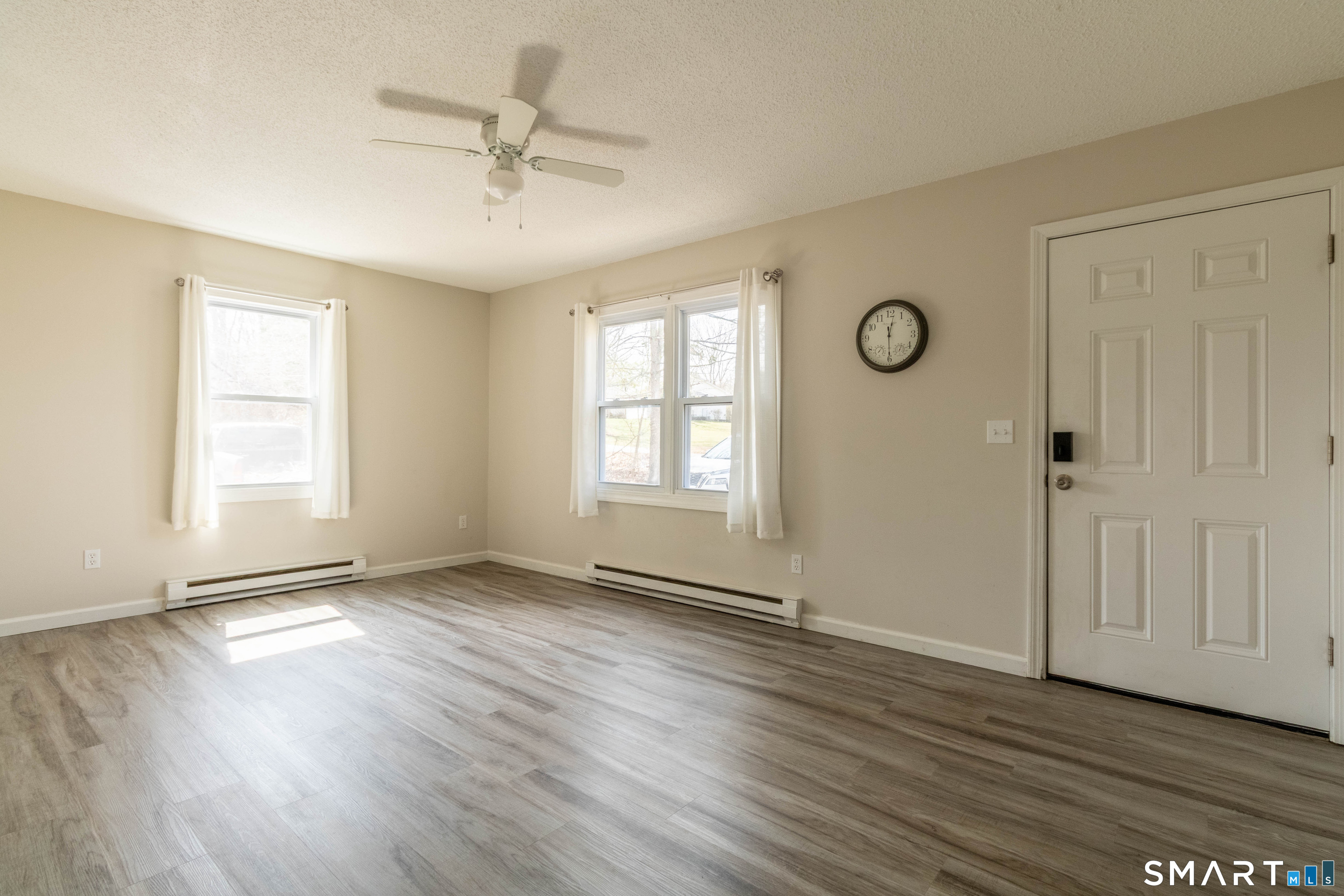 63 Whittemore Street Windham, CT 06226 - Photo 6 of 35 Living room from kitchen.