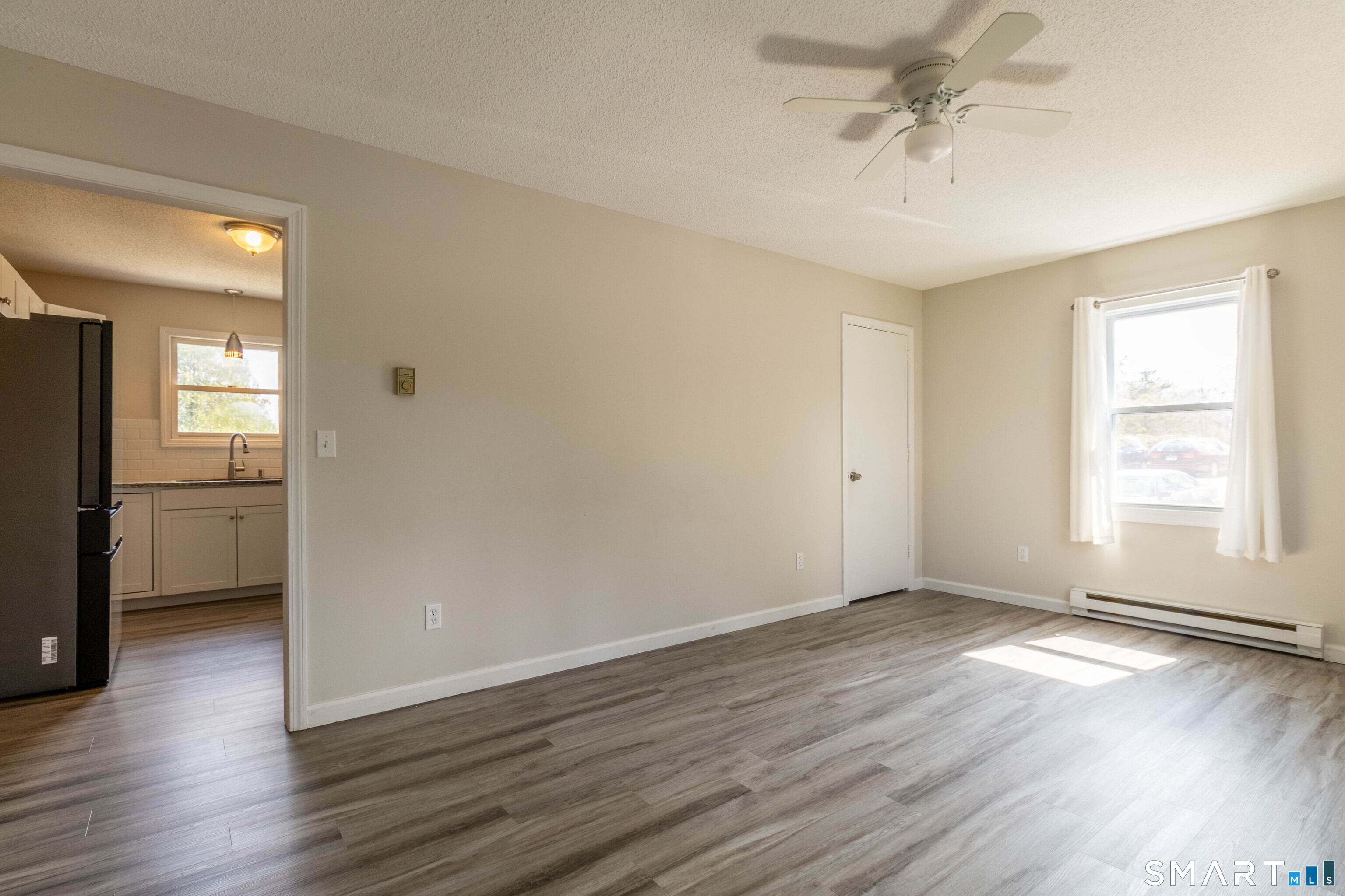 63 Whittemore Street Windham, CT 06226 - Photo 7 of 35 Living room from entry.