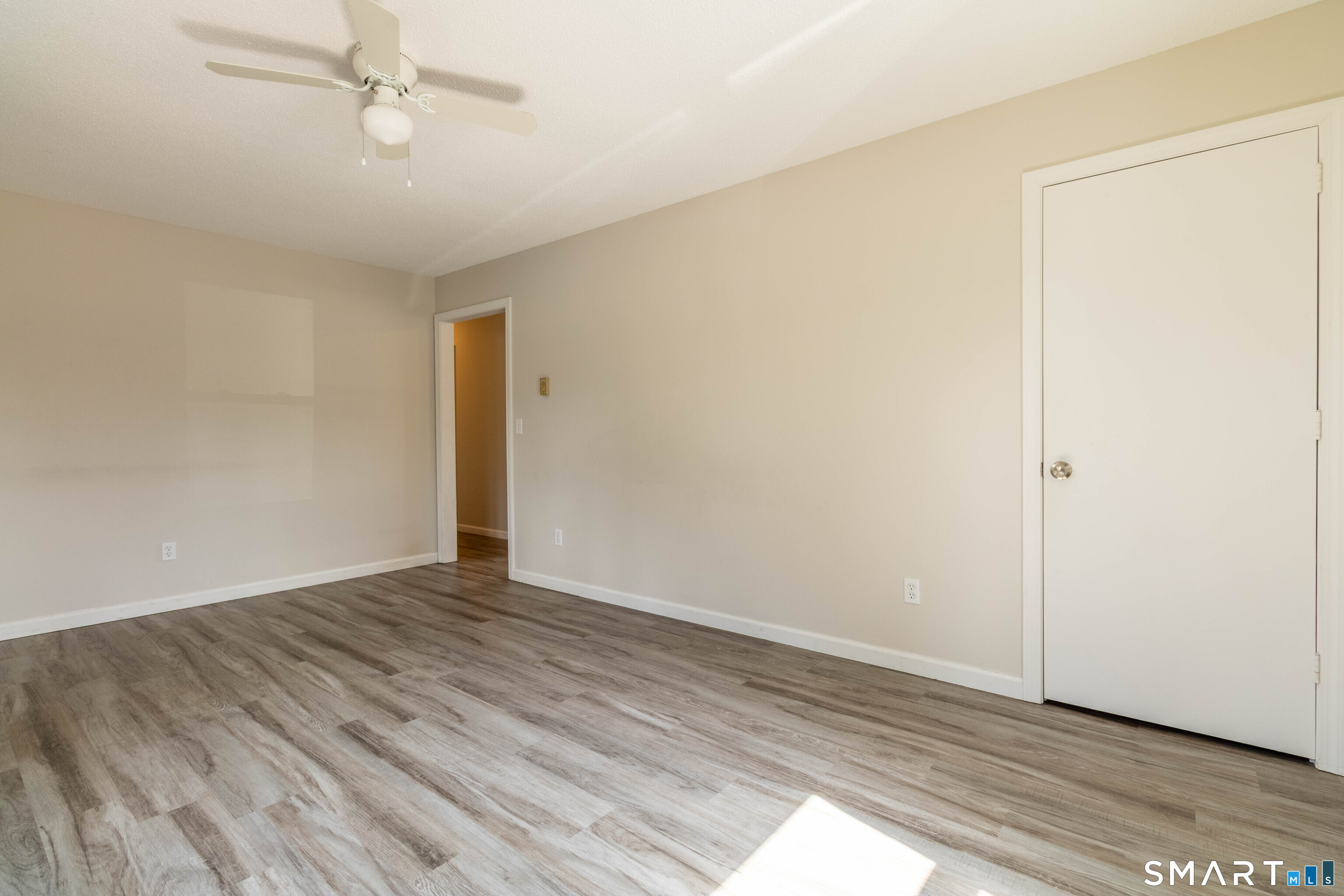 63 Whittemore Street Windham, CT 06226 - Photo 8 of 35 Living room towards kitchen.
