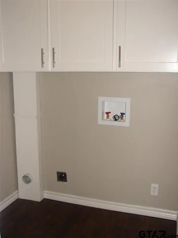 an empty room with cabinet