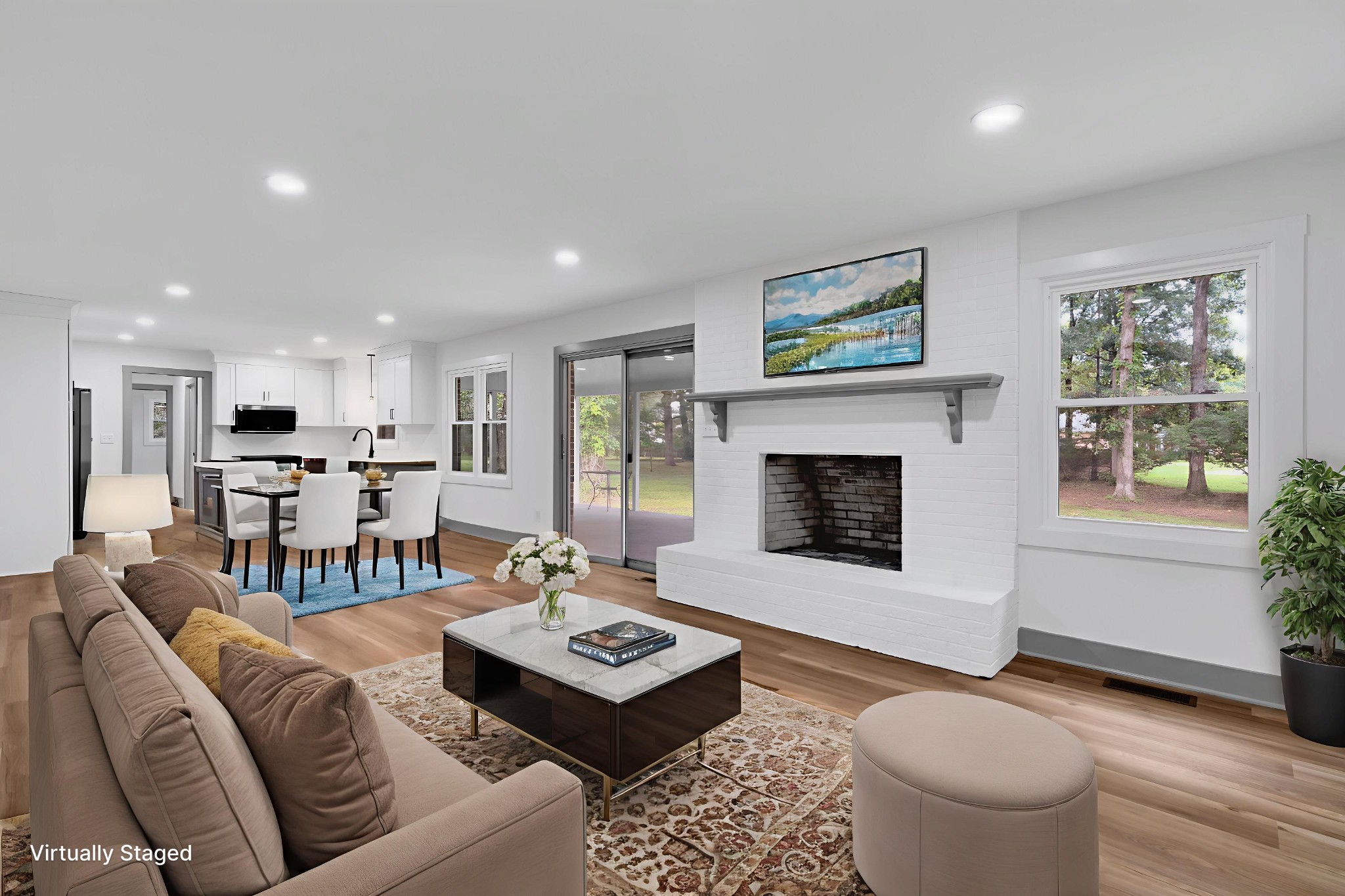 305 12 Oaks Road Tullahoma, TN 37388 - Photo 15 of 56 a living room with furniture a table and kitchen view