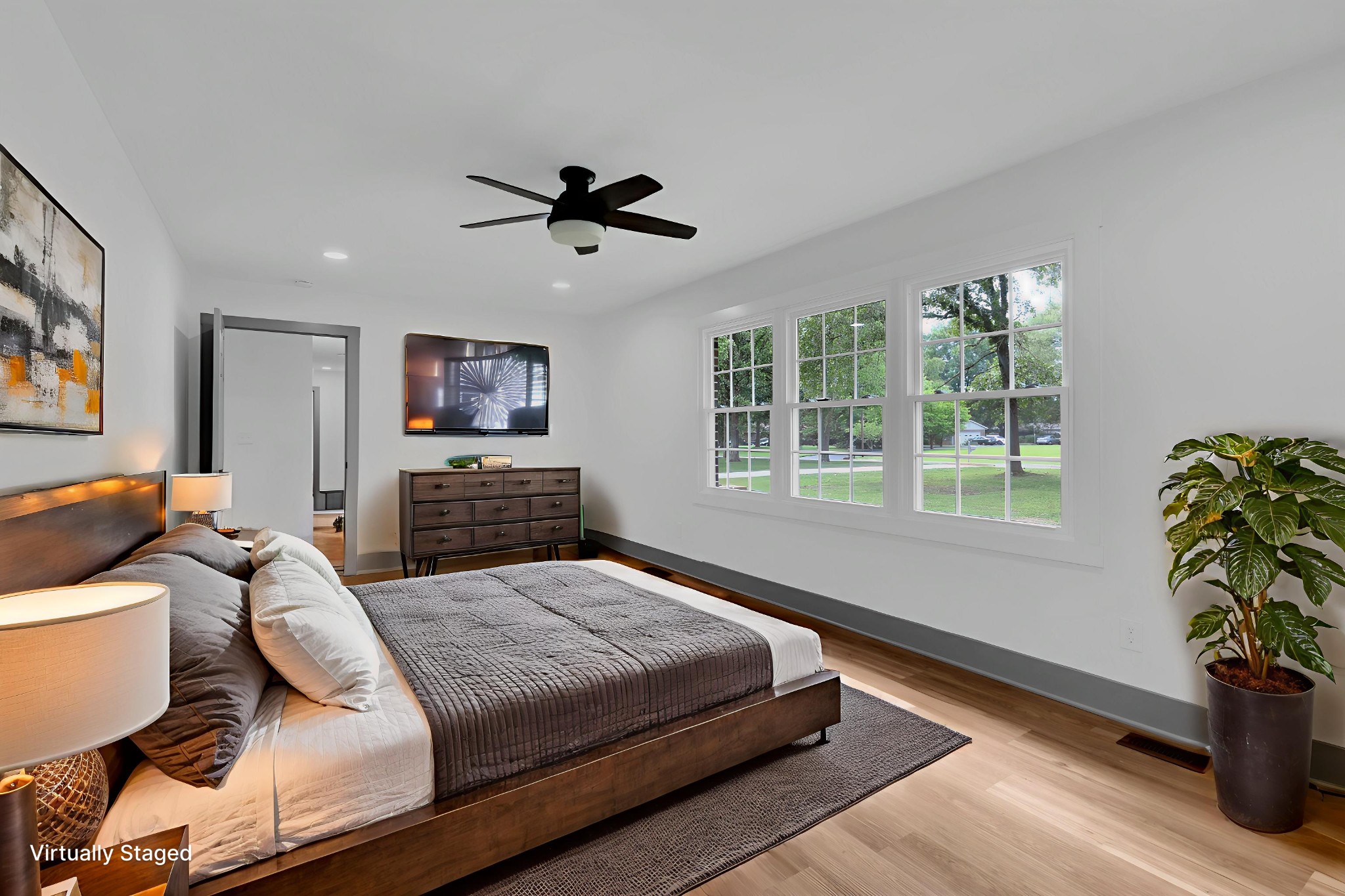 305 12 Oaks Road Tullahoma, TN 37388 - Photo 19 of 56 a bedroom with a bed window and couch