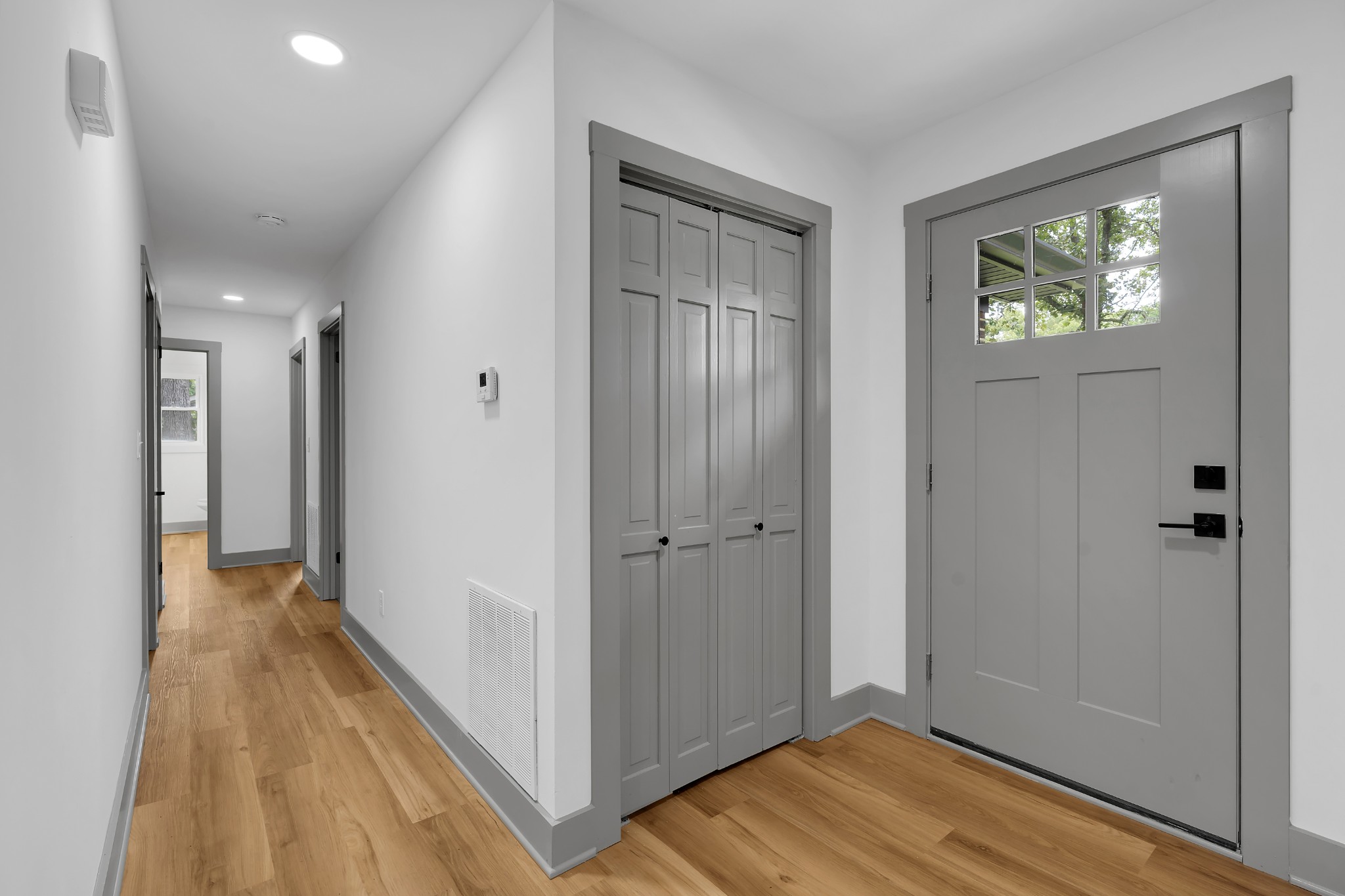 305 12 Oaks Road Tullahoma, TN 37388 - Photo 24 of 56 a view of a hallway with wooden floor and a bathroom