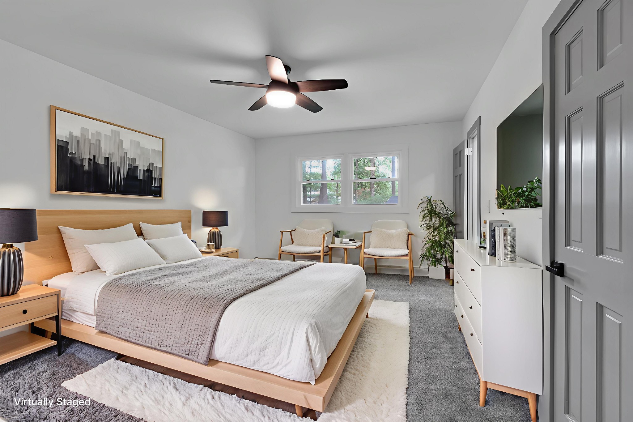 305 12 Oaks Road Tullahoma, TN 37388 - Photo 25 of 56 a bedroom with a large bed couch and windows