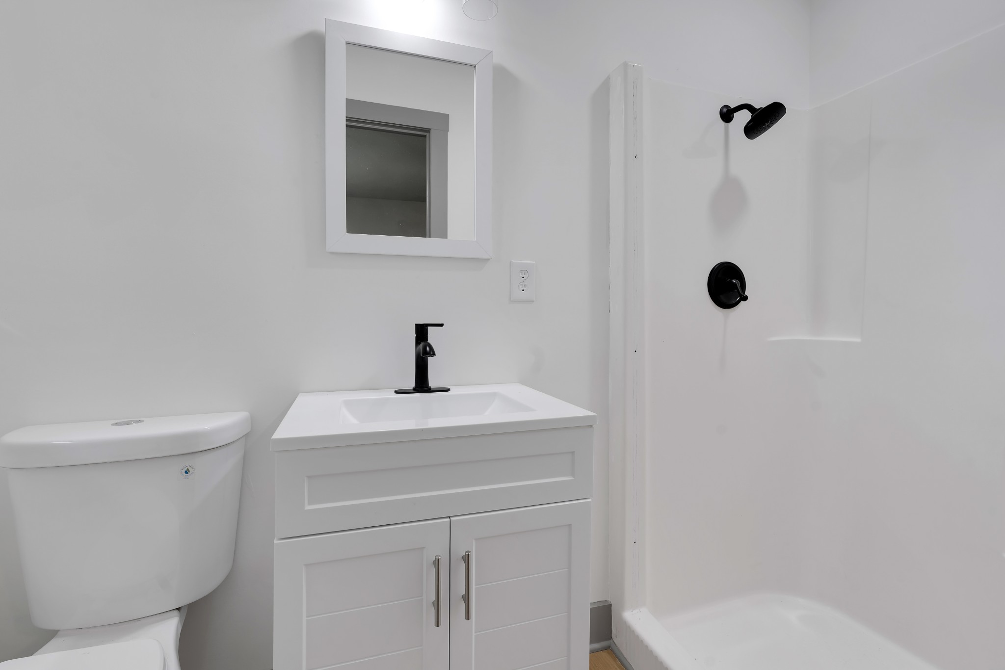 305 12 Oaks Road Tullahoma, TN 37388 - Photo 27 of 56 a bathroom with a sink a toilet and shower