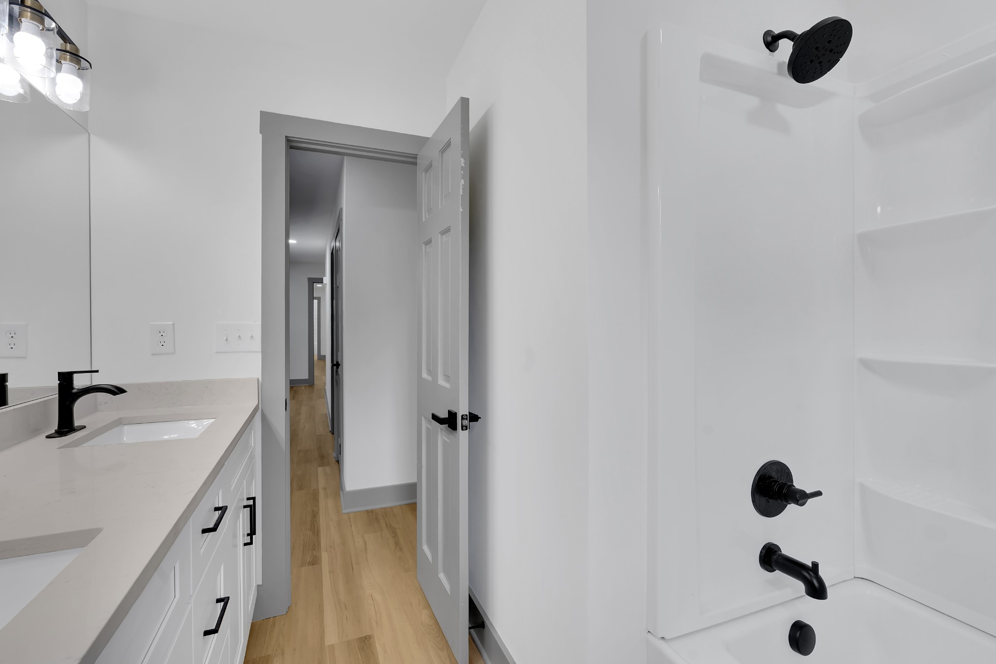 305 12 Oaks Road Tullahoma, TN 37388 - Photo 30 of 56 a bathroom with a sink a toilet and shower