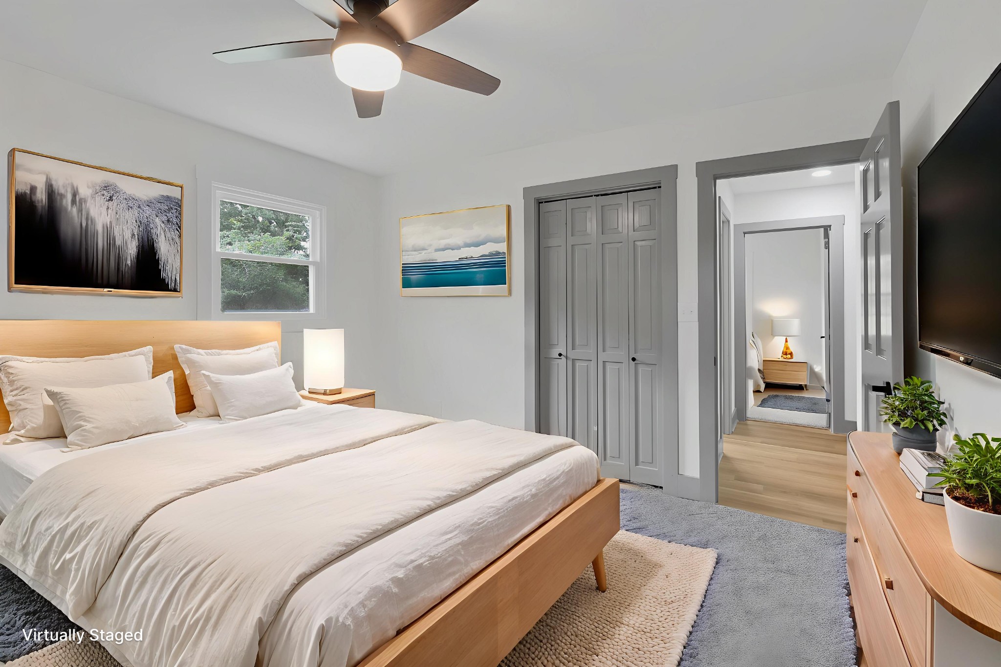 305 12 Oaks Road Tullahoma, TN 37388 - Photo 31 of 56 a bedroom with bed and a chandelier