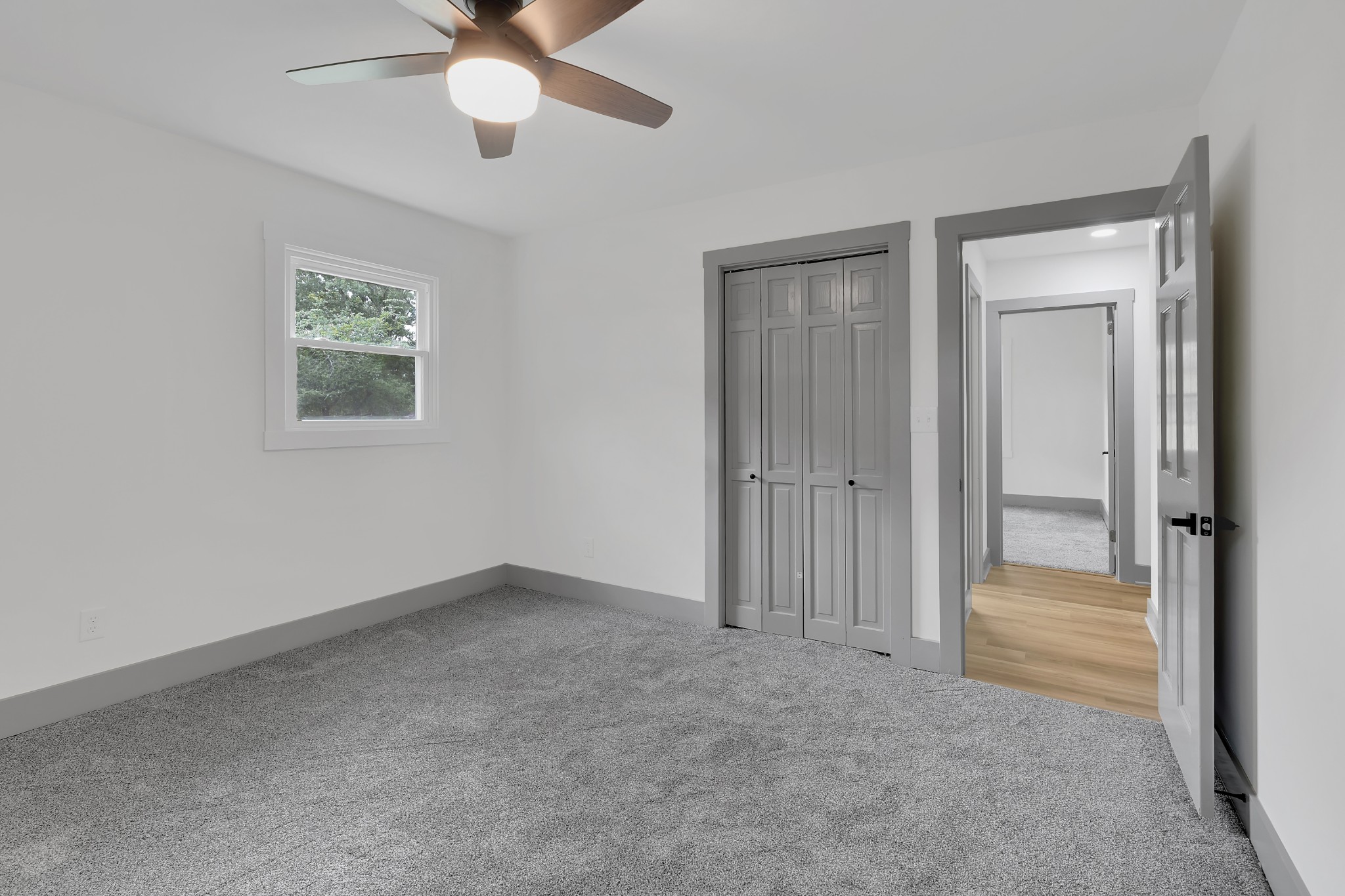 305 12 Oaks Road Tullahoma, TN 37388 - Photo 32 of 56 an empty room with fan and windows