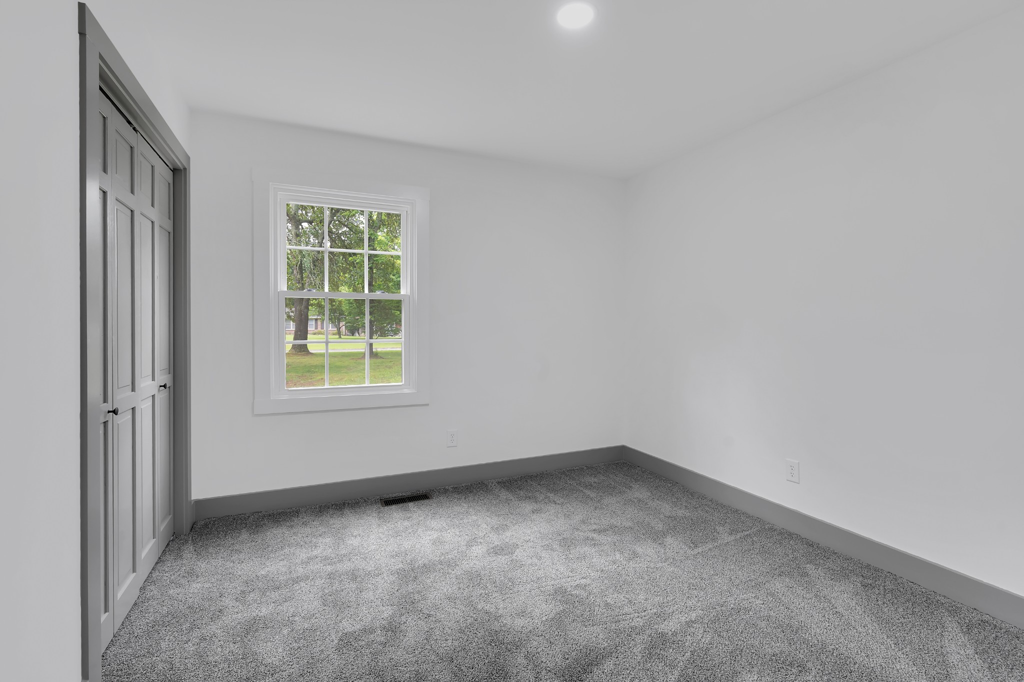 305 12 Oaks Road Tullahoma, TN 37388 - Photo 34 of 56 an empty room with windows