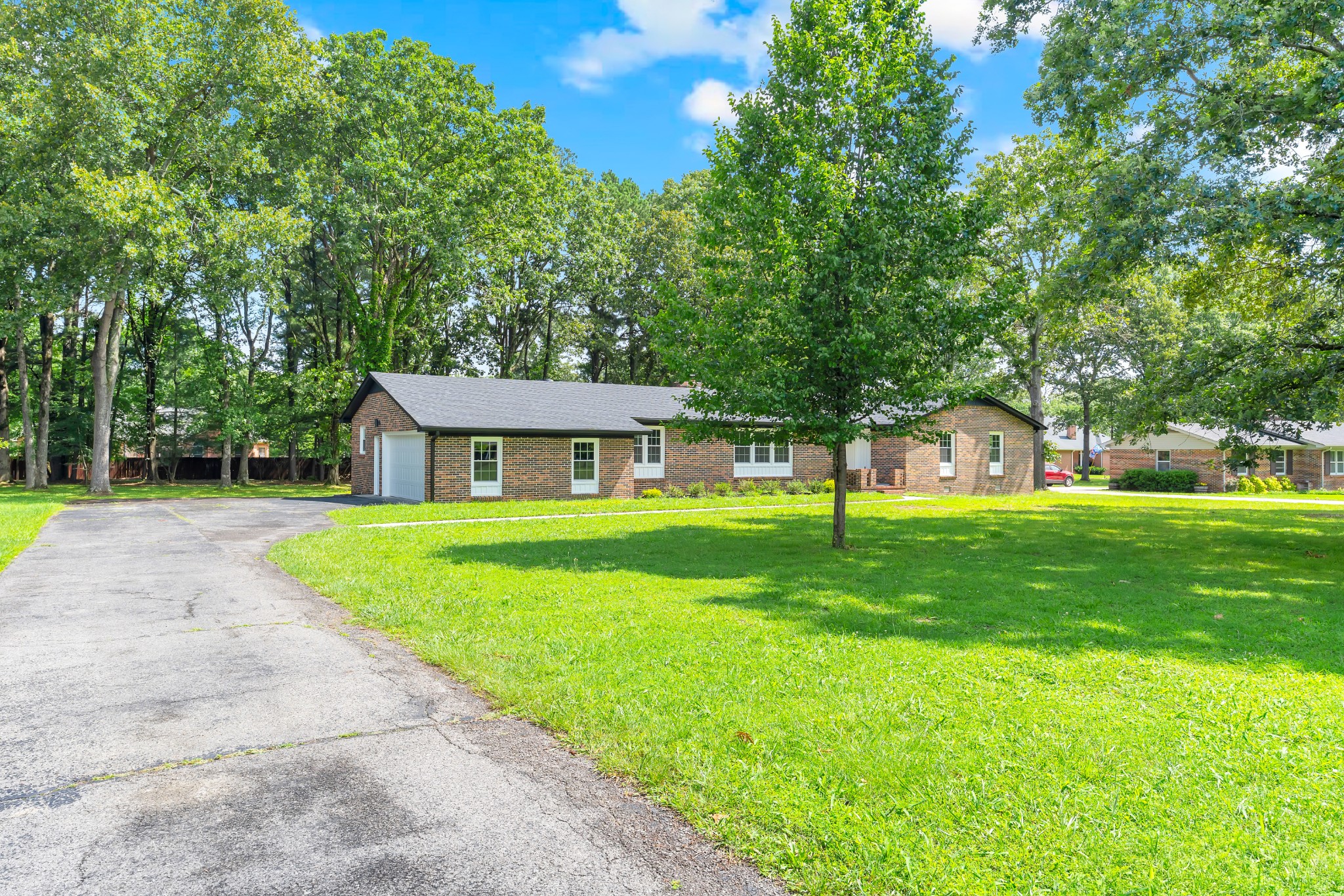 305 12 Oaks Road Tullahoma, TN 37388 - Photo 53 of 56 a view of a house with a yard