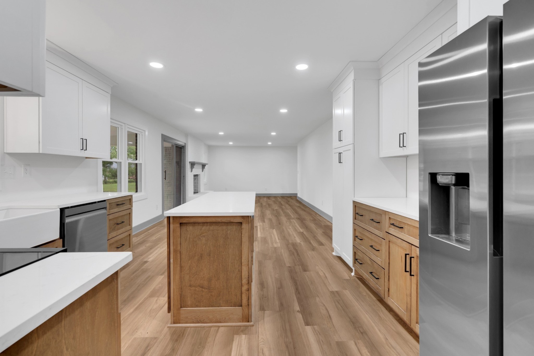 305 12 Oaks Road Tullahoma, TN 37388 - Photo 9 of 56 a kitchen with kitchen island a counter top space a sink stainless steel appliances and cabinets