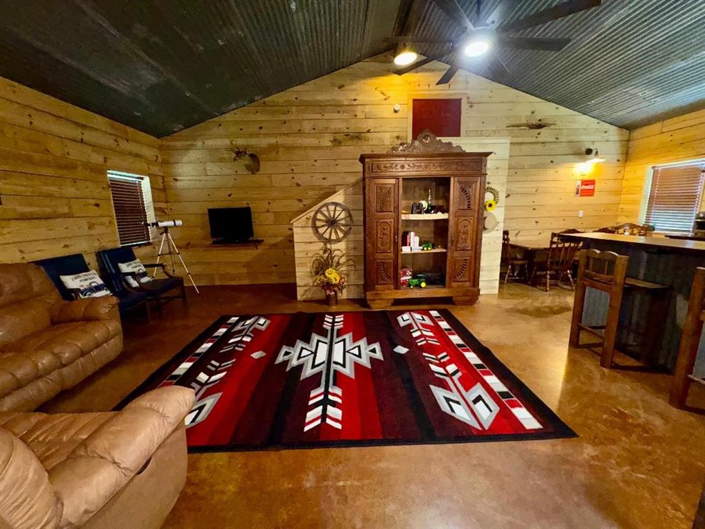 323 Slaughter Road Olney, TX 76374 - Photo 6 of 18 a front view of a house with patio