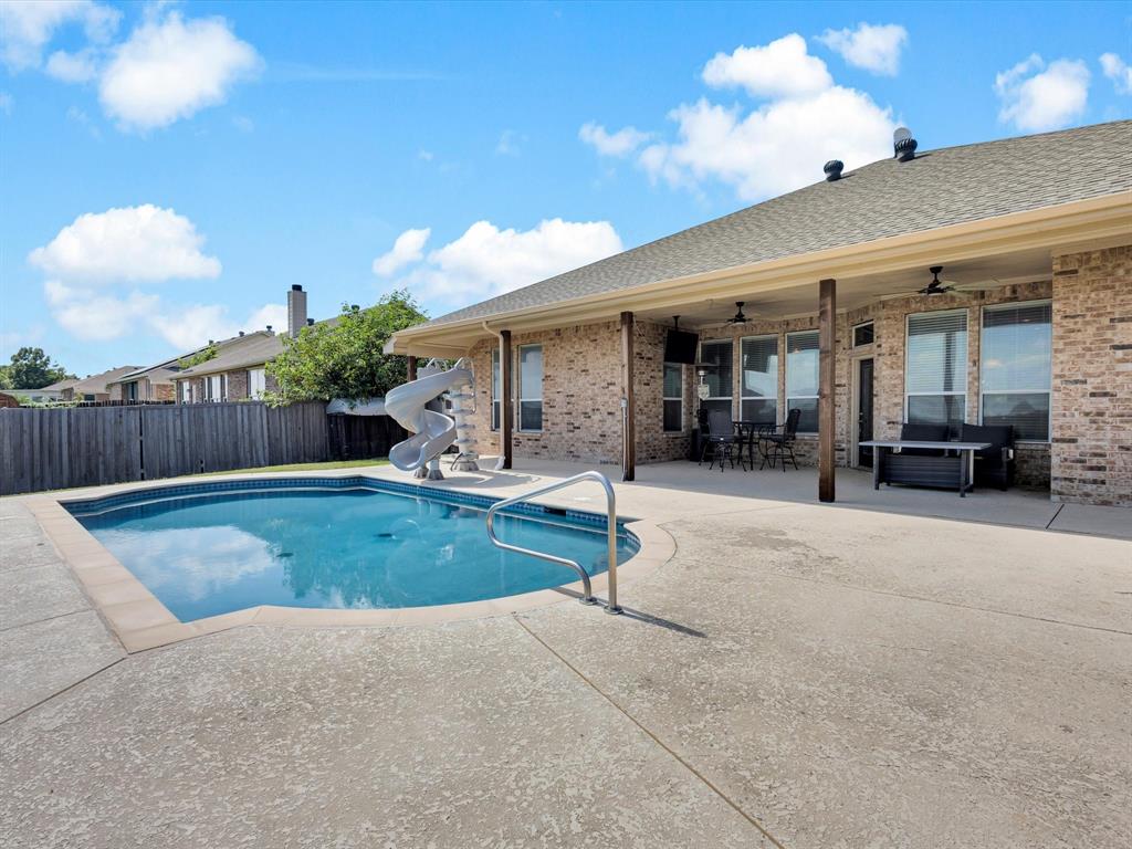 205 King George Road Ponder, TX 76259 - Photo 28 of 32 a view of a house with backyard and porch
