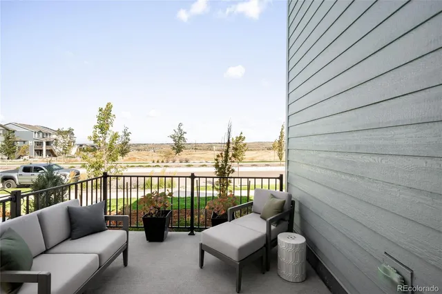 a view of a chairs in the roof deck
