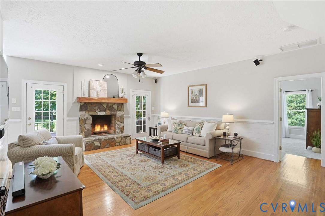 12123 Deer Ridge Court Ashland, VA 23005 - Photo 12 of 63 a living room with furniture and a fireplace