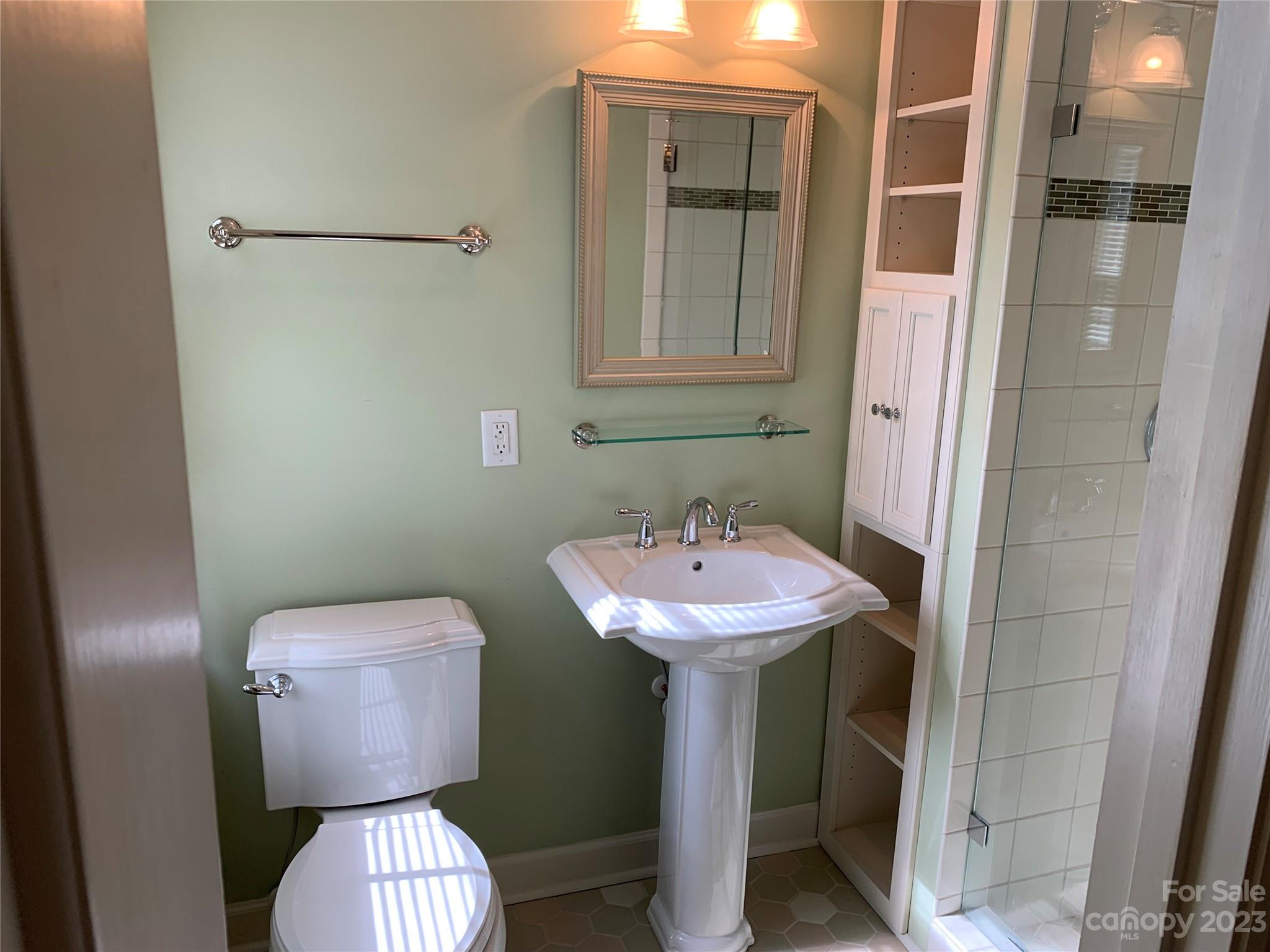 909 Nightingale Road Rock Hill, SC 29732 - Photo 16 of 38 a bathroom with a toilet sink and mirror