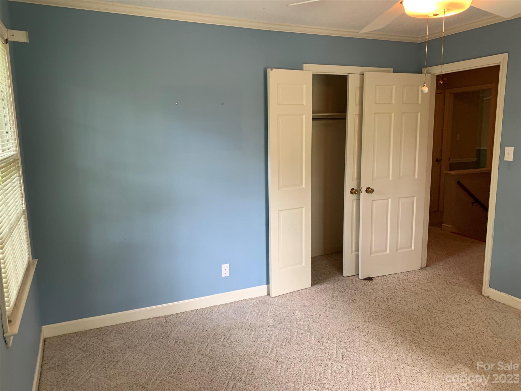 909 Nightingale Road Rock Hill, SC 29732 - Photo 19 of 38 an empty room with windows and closet