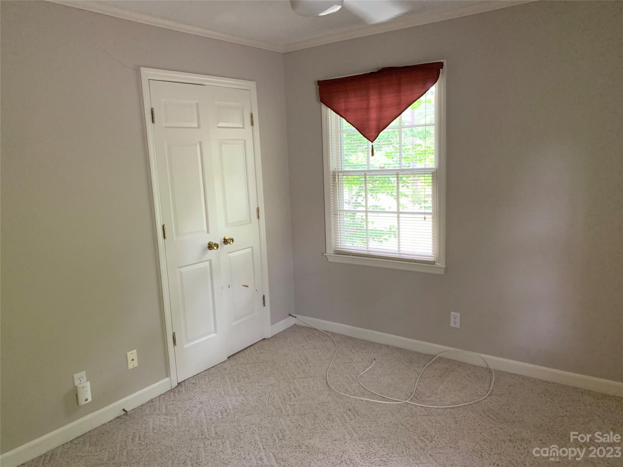 909 Nightingale Road Rock Hill, SC 29732 - Photo 21 of 38 an empty room with windows and an empty room