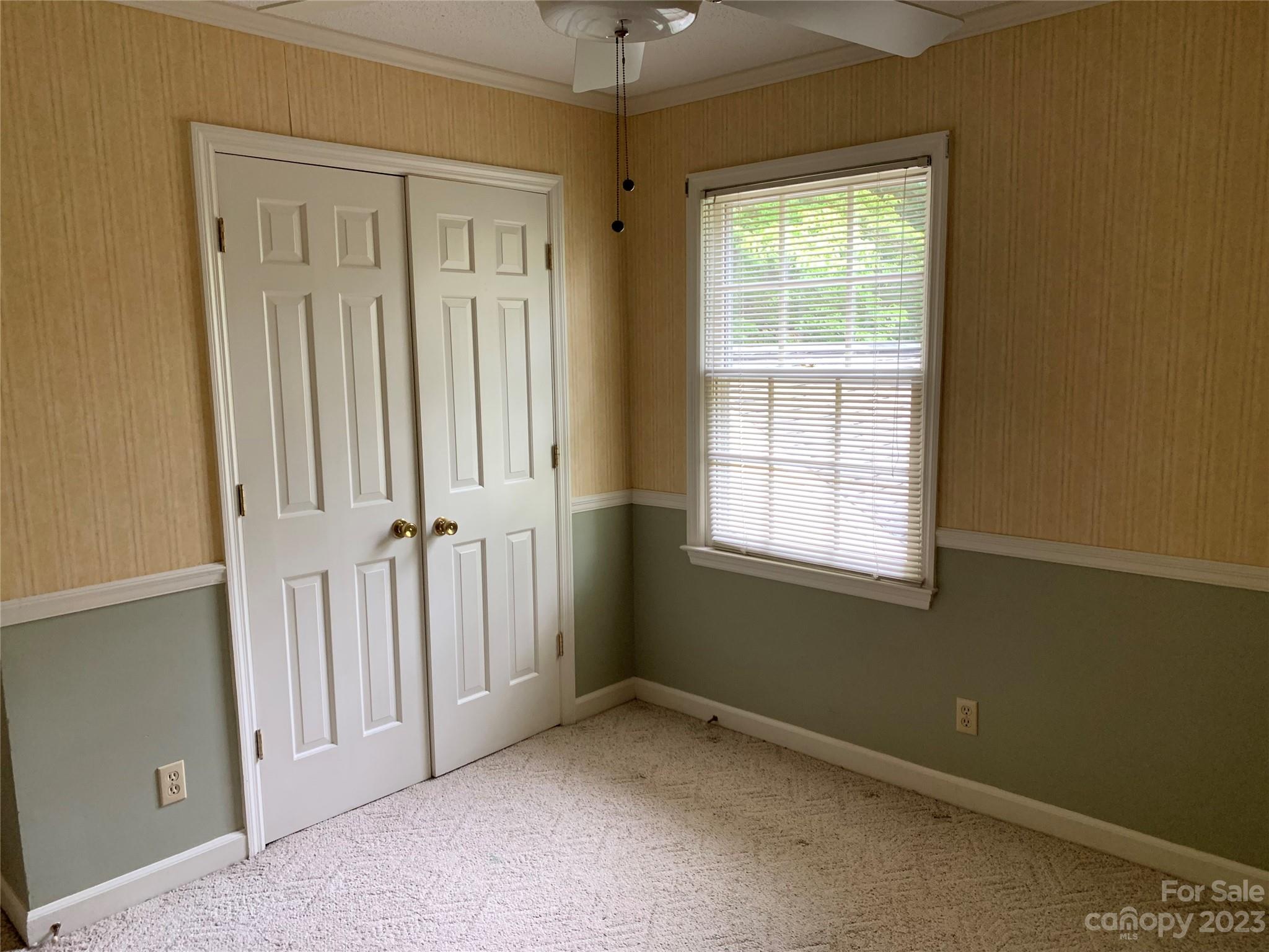 909 Nightingale Road Rock Hill, SC 29732 - Photo 23 of 38 an empty room with windows and entrance