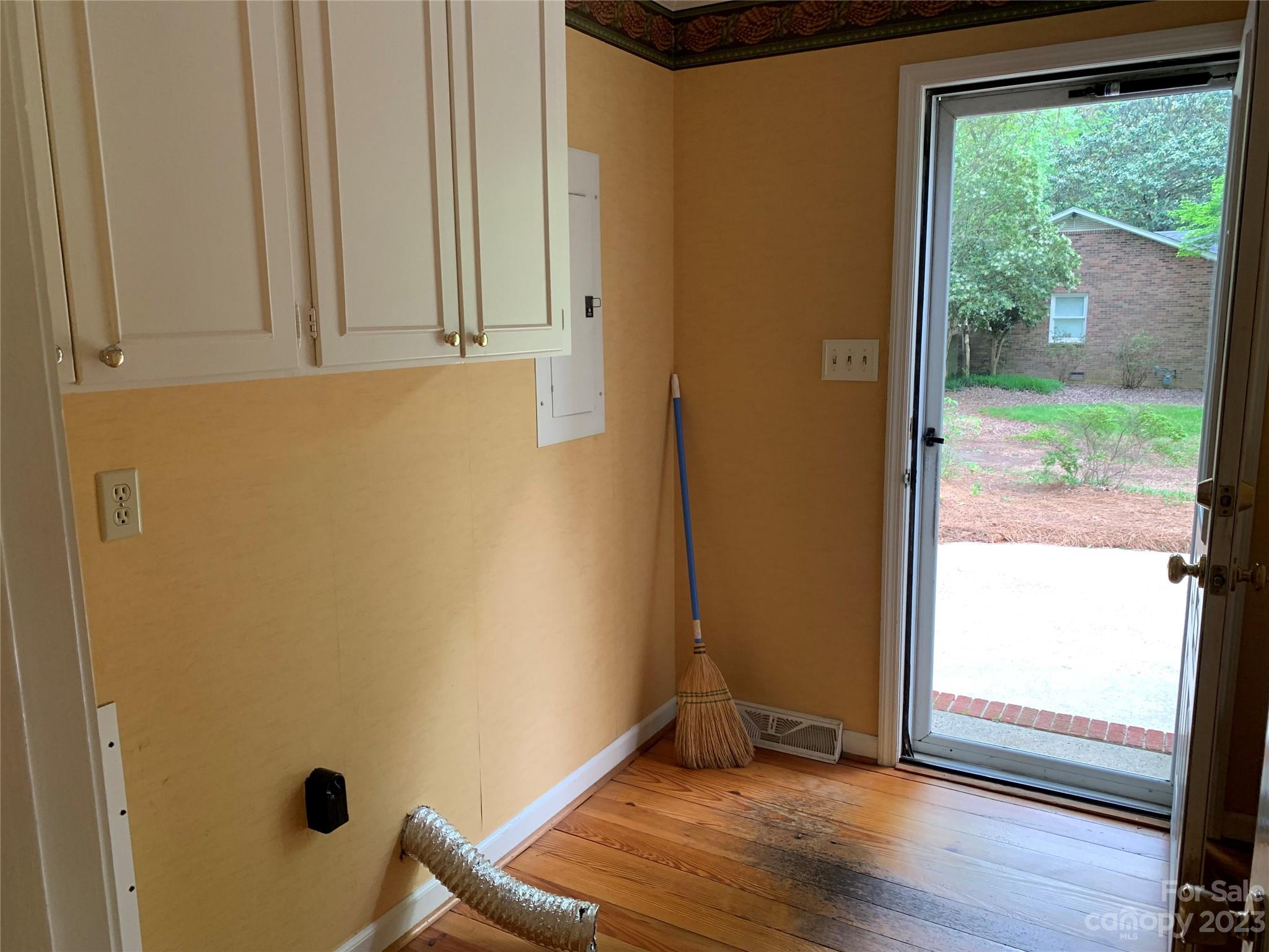 909 Nightingale Road Rock Hill, SC 29732 - Photo 26 of 38 an empty room with wooden floor and windows