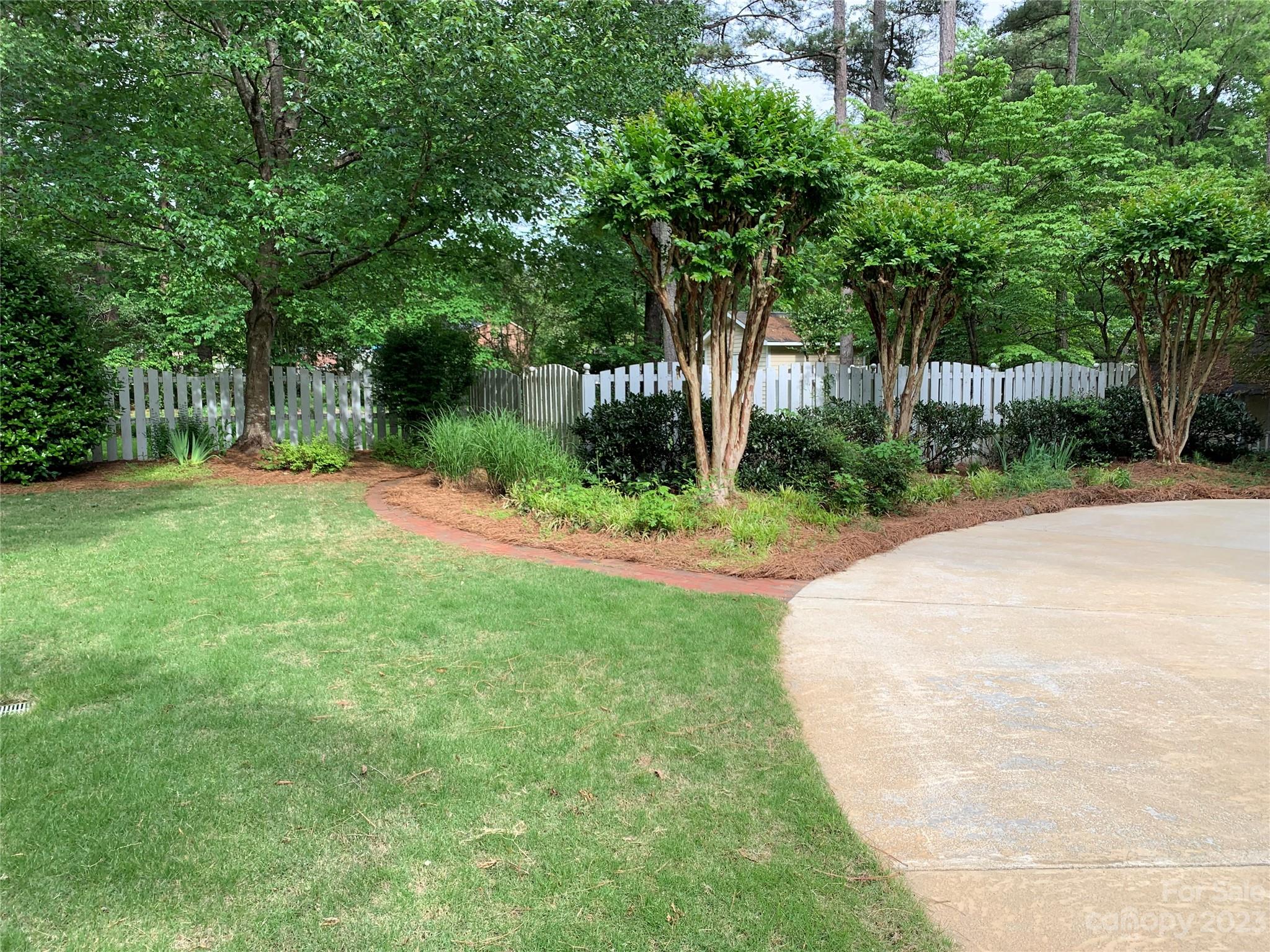 909 Nightingale Road Rock Hill, SC 29732 - Photo 30 of 38 a view of a tree in front of a house