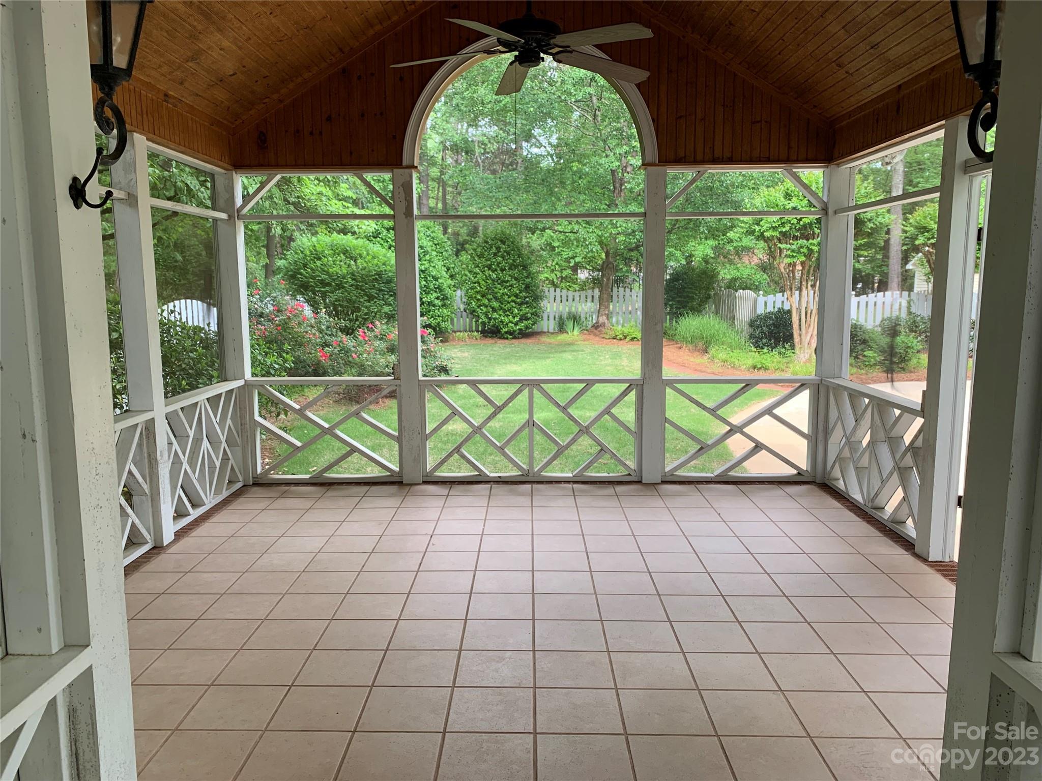 909 Nightingale Road Rock Hill, SC 29732 - Photo 32 of 38 a view of a room with wooden floor and a swing chair