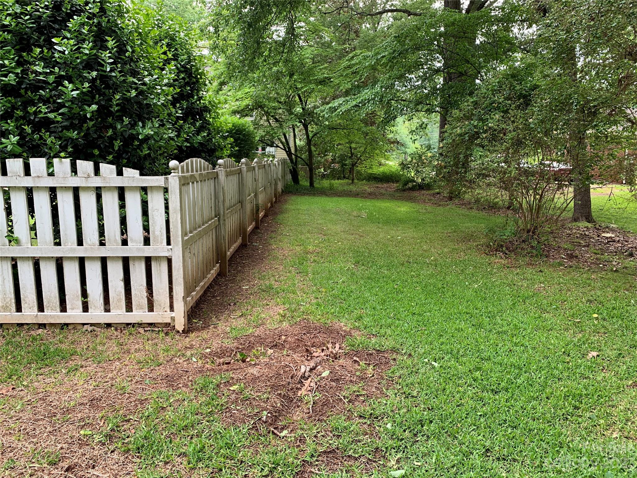 909 Nightingale Road Rock Hill, SC 29732 - Photo 37 of 38 a view of a yard with wooden fence