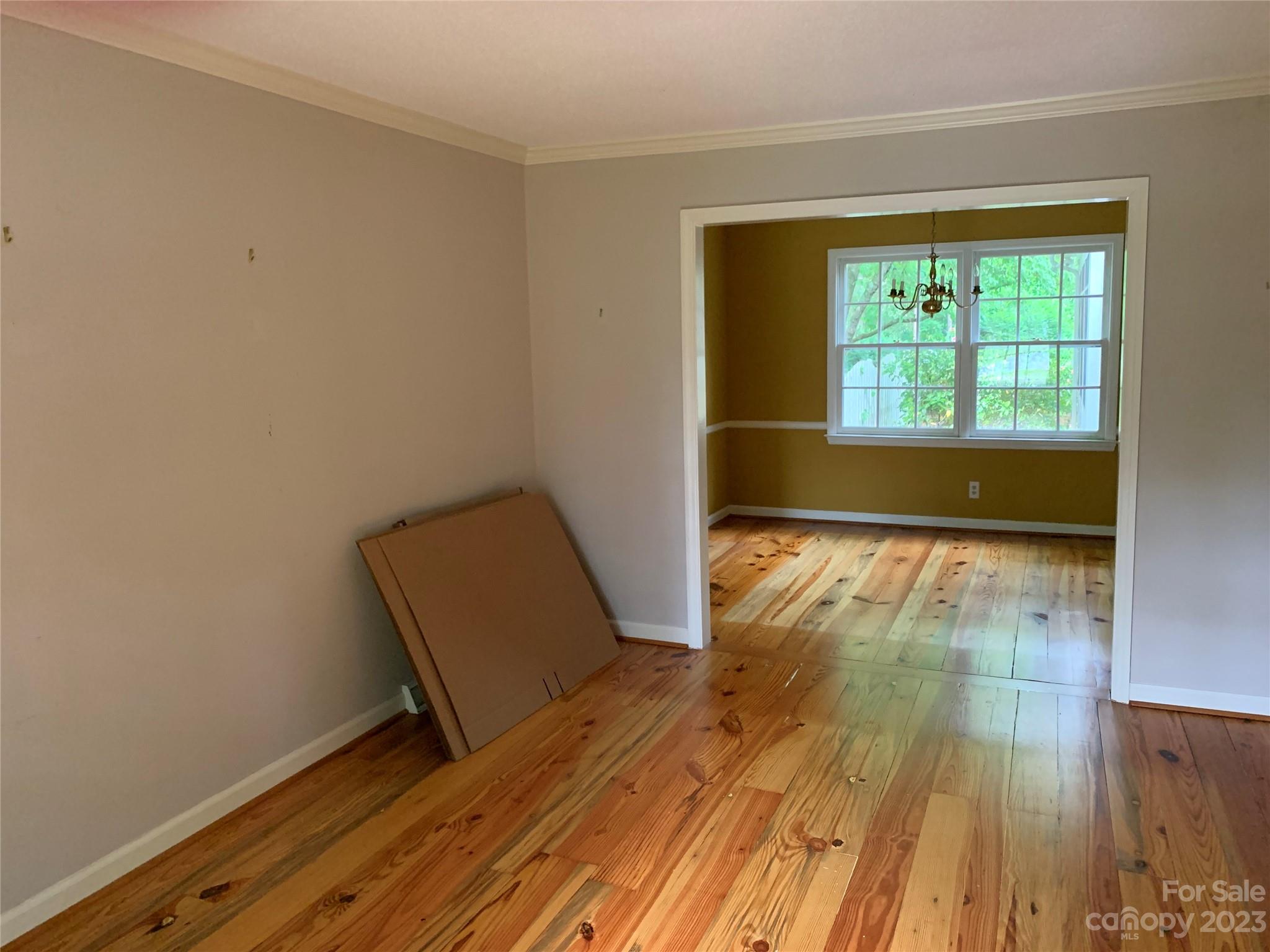 909 Nightingale Road Rock Hill, SC 29732 - Photo 4 of 38 a view of room with window and wooden floor