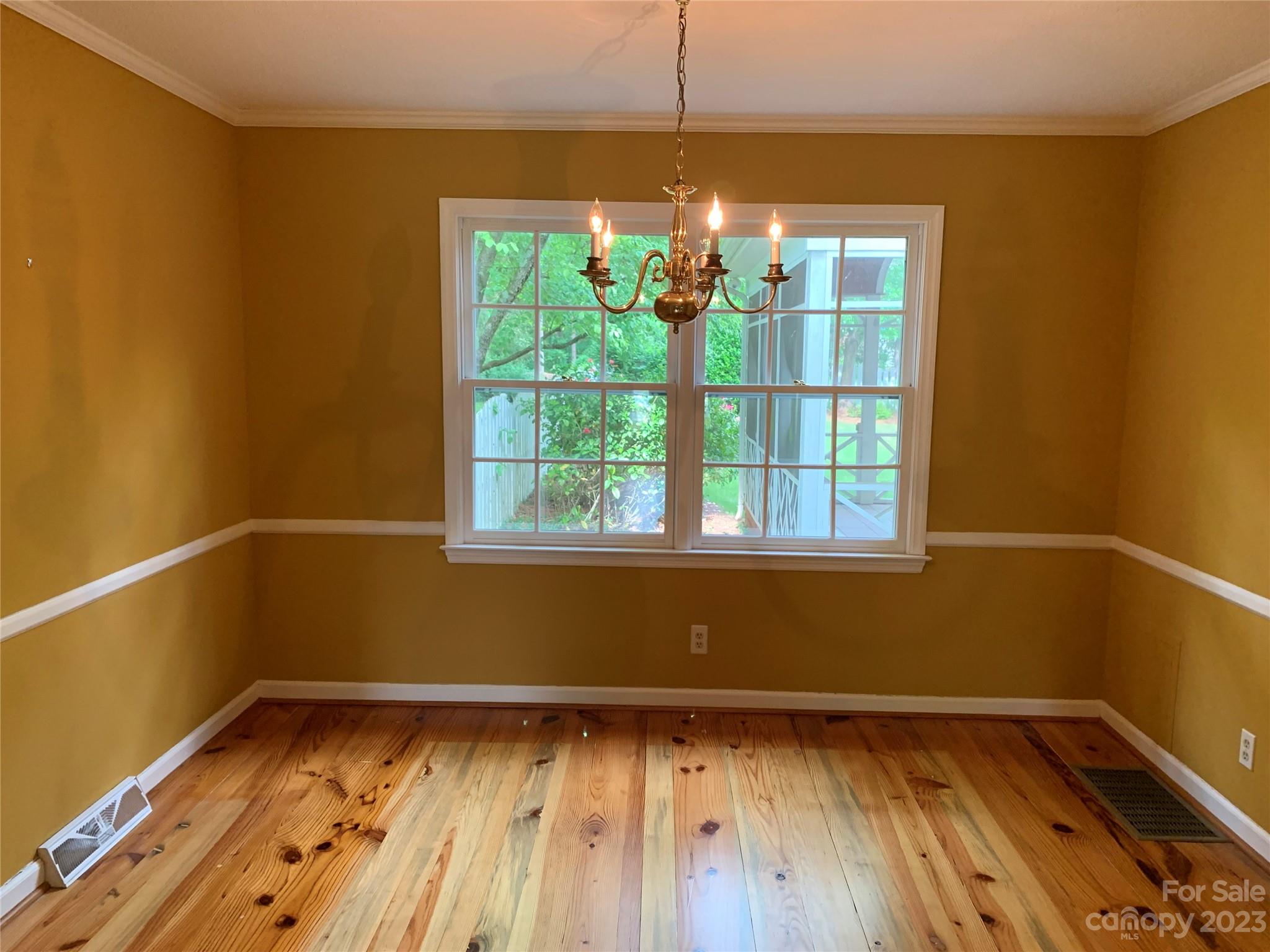 909 Nightingale Road Rock Hill, SC 29732 - Photo 6 of 38 a view of empty room with wooden floor and fan