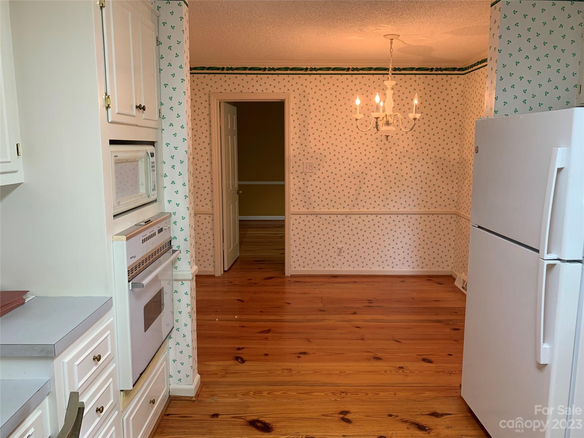 909 Nightingale Road Rock Hill, SC 29732 - Photo 7 of 38 a bathroom with a refrigerator and a sink